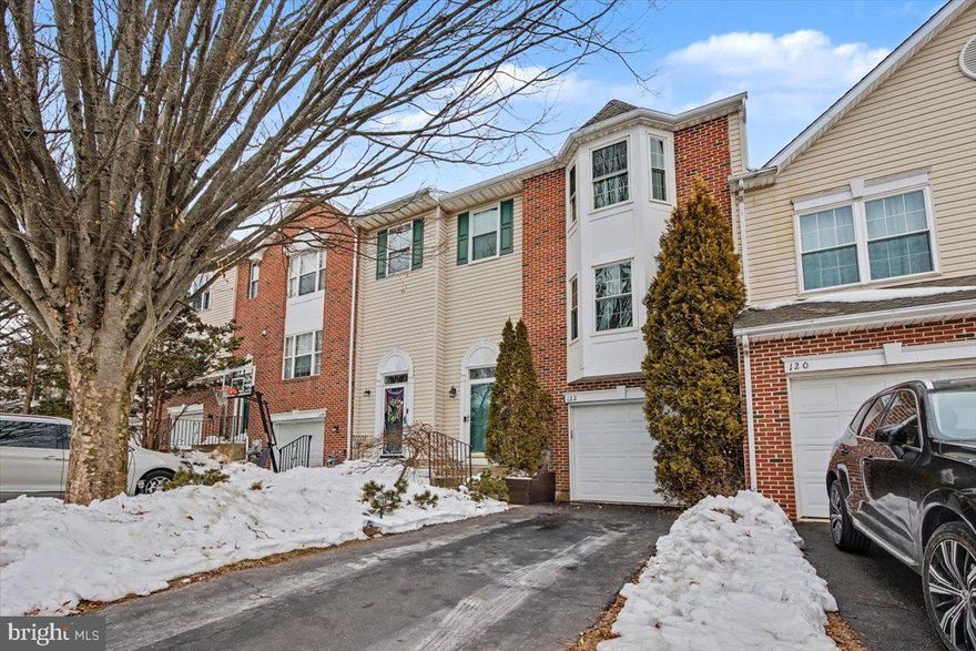 Location, Location, Location! If you have been waiting for an affordable home close to everything the area has to offer, your wait is over! Less than 5 minutes to the GSK & Pfizer Campus, Wegmans and walkable to the SEI campus, 122 Hunt Club Drive is a blend of convenience and lifestyle. The 3-level open-concept design features 3 bedrooms, 2.5 baths and a finished walk-out lower level in 2,283 SF of finished living space. Upon entering, you are greeted by the huge family room with bay window and lots of natural light. This oversized kitchen with loads of counter space and storage includes stainless steel appliances and a moveable island offering extra prep space. Thanks to a bump out, one of only a handful in the community, the oversized dining area with vaulted ceiling is big enough to entertain a huge crowd. With easy access to the deck and recently replaced windows, your guests will enjoy great views of the green space and lots of natural light. Heading upstairs to the spacious primary suite, take note of the vaulted ceilings, walk-in closet, and stunning primary bath. It has been updated to include double vanity, and a walk-in shower featuring river rock and custom tile. Step foot onto the heated floor and you will never want to leave! Two additional bedrooms, a full bath and laundry complete this level. The finished lower level offers a comfortable space for gaming, movie night or just relaxing. Additional space is the perfect spot for a home gym and direct access to the backyard makes it easy to enjoy the outdoors. Recent updates to the home include gutters (2024), finished basement (2022), primary bath (2019), water heater (2017), windows (2011), garage door (2015), and brand-new family room carpet (2026). This beautiful home is tucked away in a quiet corner of this highly desirable community, in the perfect location. There is easy access to Collegeville, Phoenixville, and King of Prussia as well as routes 422, 29 and I-76. Come discover convenience, lifestyle and all this great Collegeville location has to offer. Welcome Home!