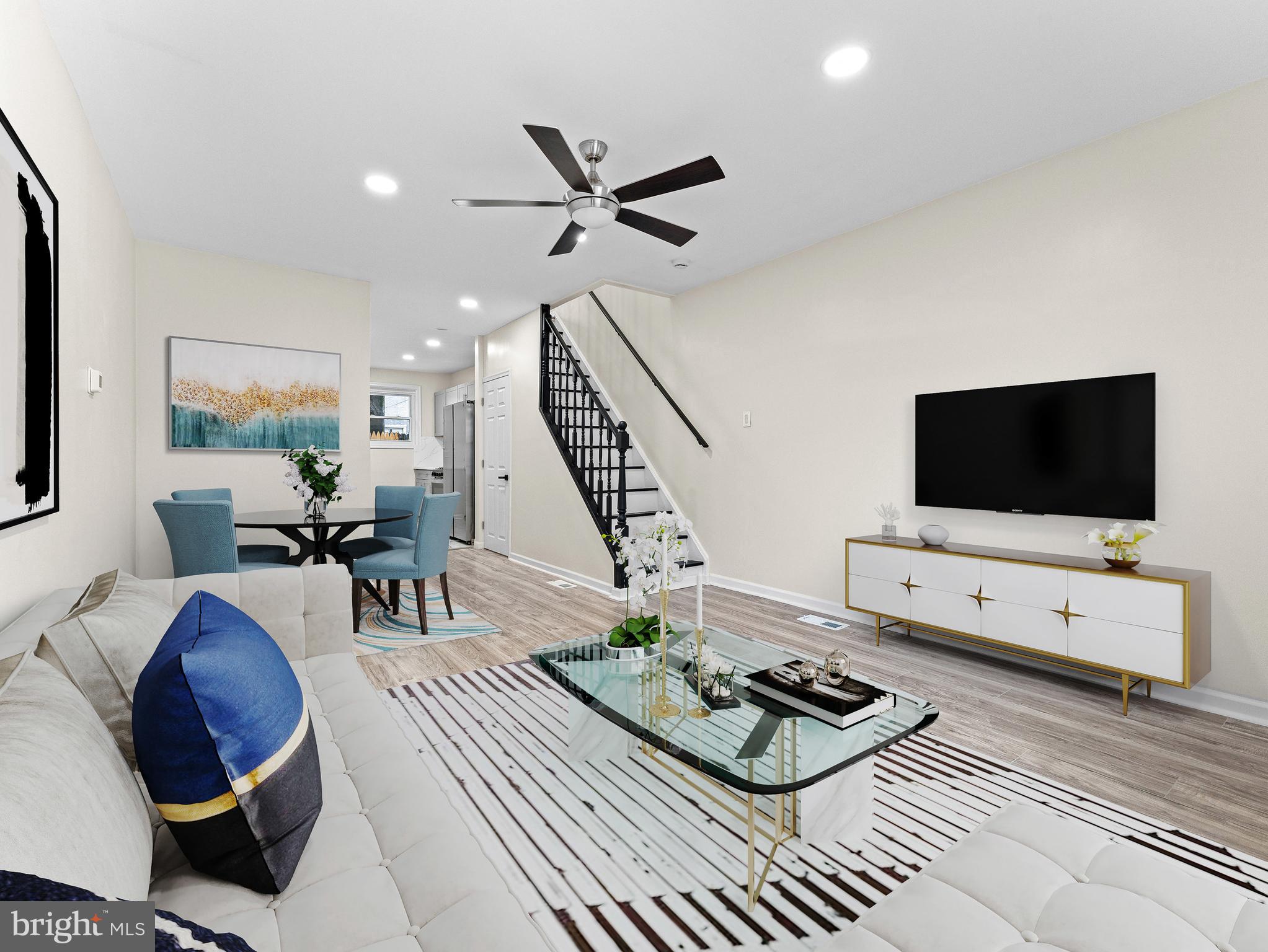 Motivated Seller! This beautifully rehabbed 3-bedroom townhouse is a true gem. With meticulous attention to detail and tasteful design, this home offers an inviting and comfortable living space. As you step inside, you'll be greeted by an open-concept floor plan that seamlessly combines the living room, dining area, and kitchen. The new floors gleam in the natural light that pours in through the large windows. The neutral color palette and modern fixtures create a clean and contemporary ambiance that will easily complement any décor style. The kitchen is featuring brand-new stainless-steel appliances, quartz countertops, and ample cabinet space for storage. It's not only functional but also aesthetically pleasing, making meal preparation a delight. A brand-new powder room completes the first floor; Upstairs, you'll find three generously sized bedrooms, each with large windows. Complete with a bathroom that boasts a luxurious shower, sleek vanity, and designer finishes. Outside, the private patio provides a perfect space for outdoor dining or relaxation. It's an ideal spot for morning coffee or evening barbecues with friends and family. This townhouse is not only aesthetically pleasing but also offers practical features such as efficient appliances, central heating and cooling, and in-unit laundry facilities for your convenience. Situated in a desirable neighborhood, you'll have easy access to local amenities, parks, schools, and commuter routes, making it an excellent choice for a modern, urban lifestyle. Whether you're a first-time homebuyer, a small family, or looking to downsize, this meticulously rehabbed 3-bedroom townhouse is a turnkey solution for your housing needs. Don't miss the opportunity to make it your own and enjoy the best in contemporary living.