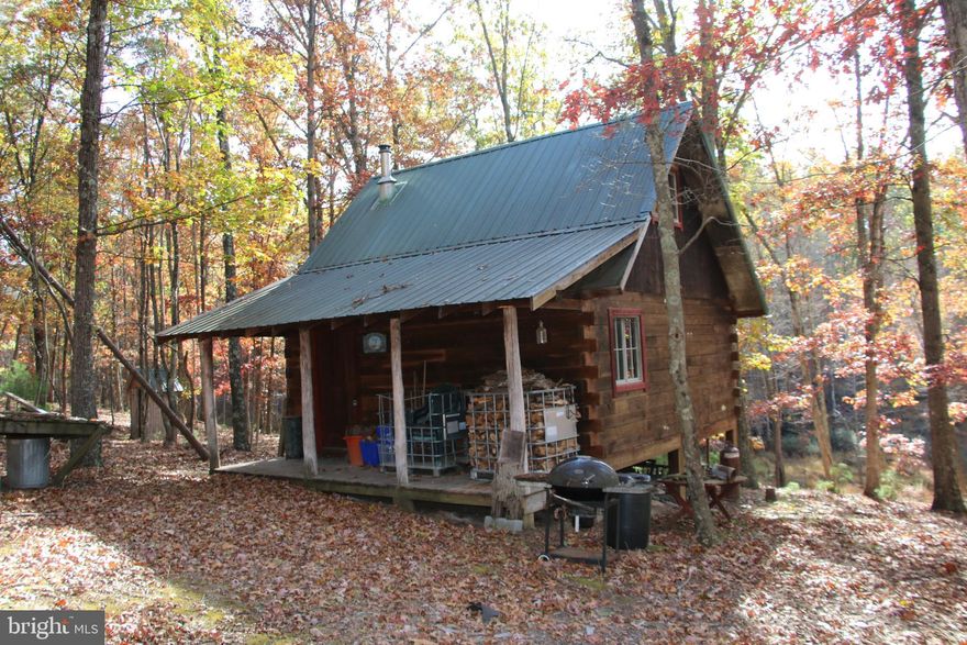 Own a piece of the beautiful Siler Heights community in Cross Junction. Located just minutes northwest of Winchester near Lake Holiday. Access is secured via extensive road frontage on Easter Ridge Lane. Features a fully functional hunting cabin with a wood stove and propane used for heating and cooking. The cabin has an open layout and separate sleeping quarters via a loft. Experience exciting hunting as many types of wildlife call this property home including deer, turkey, and many small game species. There are potential building sites located throughout the property. This tract is currently being used for recreation but it would also make an excellent site for your dream home or vacation rental. Stellar views of the surrounding countryside are attainable with some tree clearing. This property features mildly sloping topography which is builder friendly and allows for enjoyment of the land. Currently enrolled in the county’s forestry land use program to reduce the annual taxes. This is a fully wooded property that is zoned Rural Areas (RA). Enjoy hiking, camping, and recreation of all types on this land. A short drive from all the amenities and attractions Winchester has to offer.  

***Additional adjoining acreage available for purchase. See aerials for details.***
***The land and cabin are being sold in AS-IS condition.***