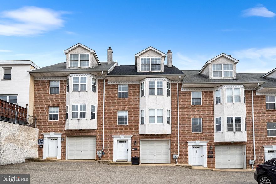Welcome Home to this magnificent townhome in the heart of the vibrant neighborhood of Manayunk!  This home features modern luxury with 3 bedrooms, 2.5 baths, open living space with a GARAGE and 2 PARKING SPACES! Upon entering you'll notice the owner has taken meticulous care of this fabulous home. The main living level features a spacious family room featuring a stone fireplace and new wide planked oak hardwood floors that flow into the sunny eat-in kitchen featuring beautiful granite countertops, upgraded stainless steel appliances, designer tile backsplash, custom blinds throughout from the Shade Store,  powder room with Kohler fixtures and a sliding glass door leading out to the relaxing oversized composite deck.   Step upstairs to find 2 generously sized bedrooms that provide flexibility for guests, a home office, or family needs.   The primary suite is a true private retreat, complete with a walk-in closet, a spa-inspired en-suite bathroom with a soaking tub, dual vanities, and a glass-enclosed shower. 
Additional features include a first floor laundry room, large storage room, 1 car garage PLUS 2 parking spaces which is so rare to find!! The location is fantastic! Nestled in the quiet hills of Manayunk and still conveniently located  to the town with so many great shops and restaurants. With proximity to public transportation, entrances to 76 East and West, and the Manayunk bike trail, commuting to Center City Philadelphia is a breeze. This home is a must see!!