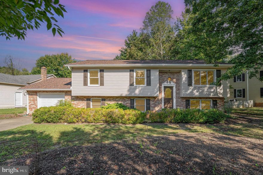 Welcome to a beautifully updated home in a peaceful, well-established neighborhood, offering modern comfort and style throughout. This move-in ready home features four bedrooms and three bathrooms, with new carpet in the bedrooms and lower level (2025), a new roof (2022), and a heat pump (2023). The kitchen, fitted with appliances all under five years old, offers a bright, modern space perfect for cooking and hosting.

Step outside to enjoy the deck (2023) with a new back door (2025), overlooking a fully fenced backyard ideal for pets, play, or entertaining. The primary bathroom (2025) and hall bathroom (2025) showcase modern updates, while the exterior improvements—including new vinyl siding, shutters, and wrapped windows (2025)—enhance both style and curb appeal.

Located just minutes from major routes (208, Rt 1, Rt 3, I-95), commuting is effortless, and nearby schools and amenities make everyday life convenient. Combining functional spaces with a welcoming atmosphere, this home offers a perfect blend of comfort, style, and location for your next chapter.