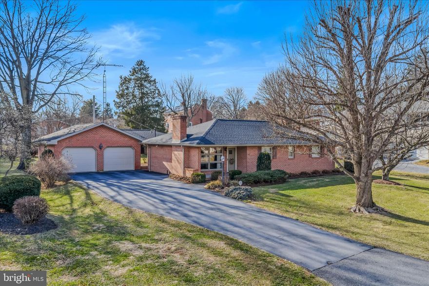 Charming all-brick rancher ideally located near a park in Martinsburg, WV, situated on nearly half an acre. This well-maintained home features a 2-year-old architectural shingle roof with a transferable warranty for added peace of mind. Inside you’ll find 3 bedrooms and 1.5 baths, complemented by beautiful hardwood flooring throughout.

The full basement offers walk-out stairs and is partially finished, providing flexible additional living or recreational space. Outside, enjoy an oversized detached garage, an inviting covered brick patio—perfect for relaxing or entertaining—and a large outbuilding with attached pet run/housing. The property backs to an alleyway, adding convenience and accessibility.

So much to love about this quaint and welcoming home!