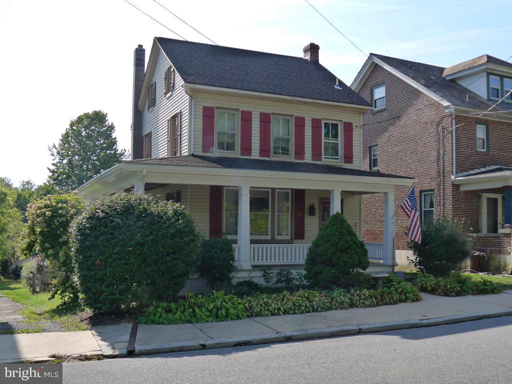 If you like charming old houses filled with character- this is the home for you! Located near park & pool; only minutes form Rt 222 & turnpike. Newer roof; possible 4th bedroom or den on 3rd floor; 20'x40' garage with shop; beautiful chestnut trim & some hardwood floors; brick underneath siding.