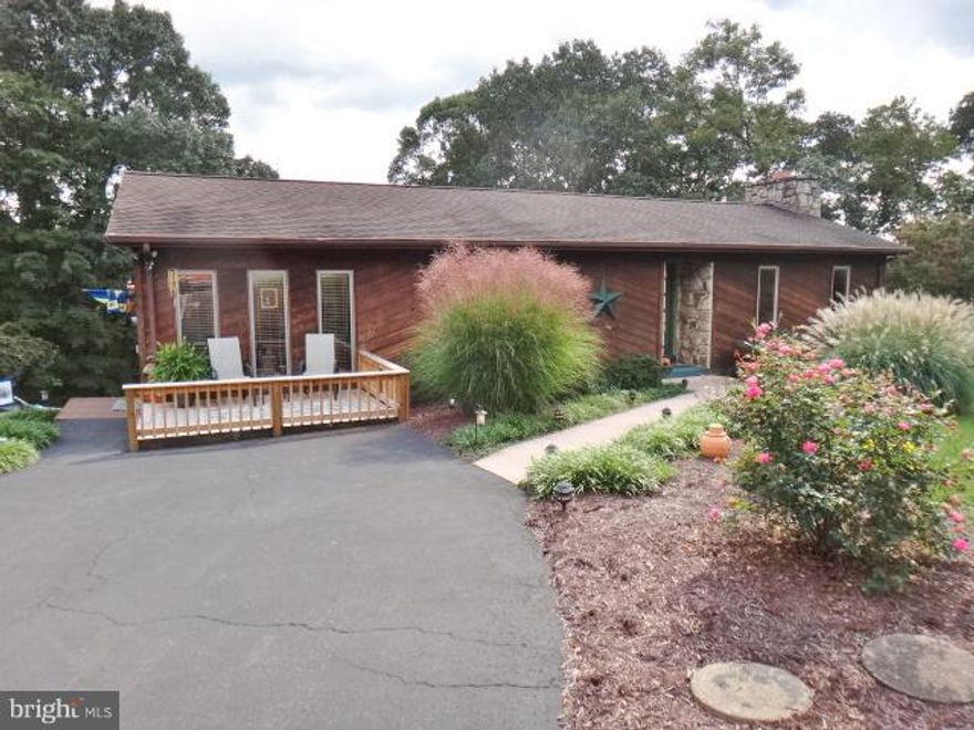 Unique Rancher located in Ridgeley, WV. Cedar siding, 3 bed, 2.5 bathroom home with family room and great room with vaulted ceilings, beautiful stone gas fireplace, a newly, remodeled kitchen with granite counter tops and an above ground pool. Very private and meticulously maintained.  Call office for a showing! Additional tax id# 29047C007600010000.