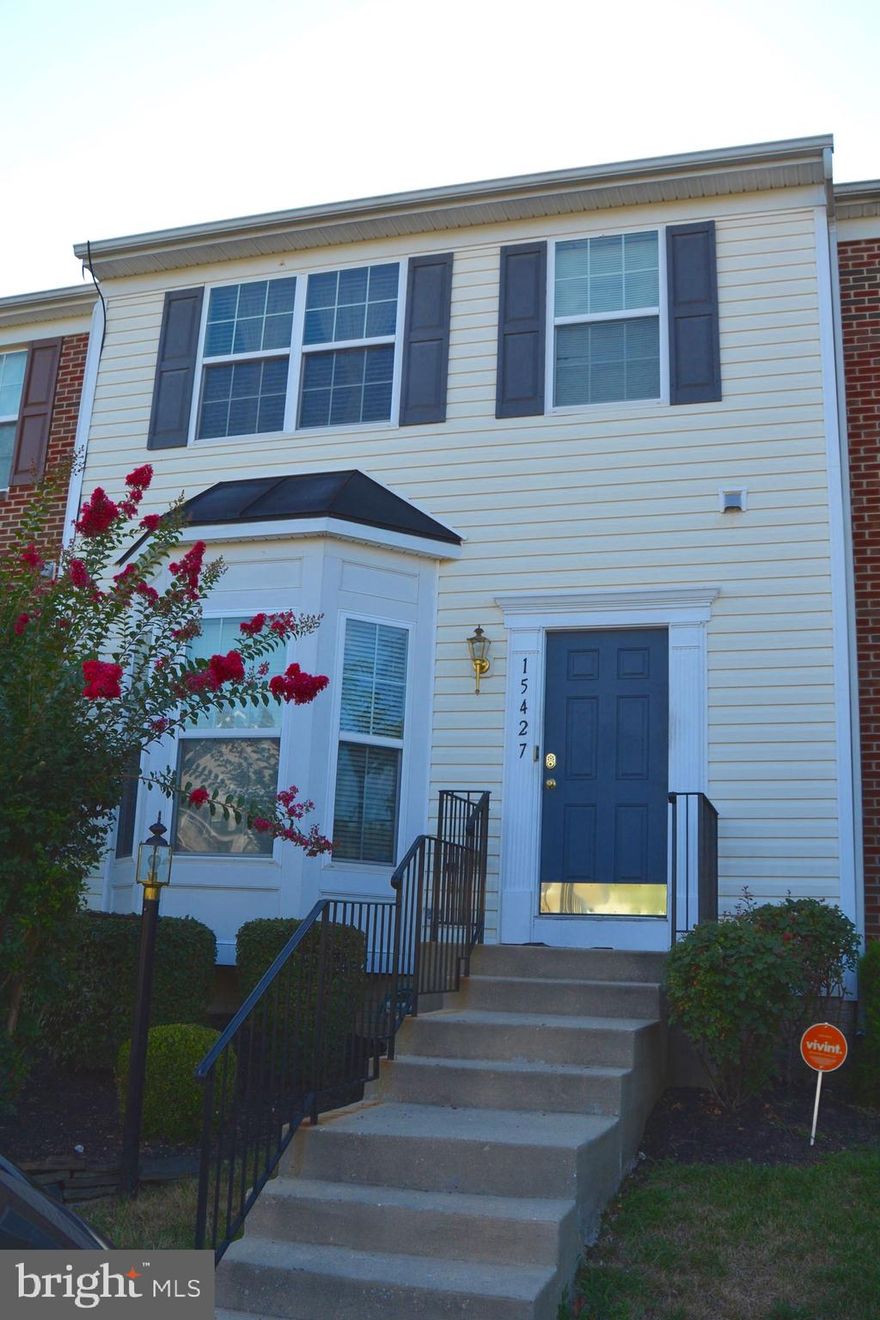 SHOWS LIKE A MODEL HOME!  Open floorpan neutral paint throughout.Upgrades Galore! Granite counter tops, stainless steel appliances , washer & dryer porcelain  tile kitchen flooring , new hardwood flooring on main level and basement  carpet in bedrooms and, master bedroom bath new sliding shower door. Designer Ceiling Fans and light fixtures. In addition a 4th room in lower level can be used a Bedroom, Childs Play Room, GYM or Home Theater use your imagination. Back yard Oasis deck and patio completely fenced in lower level backs to trees for privacy . Property affords you community pool, club house, tennis court, and tot-lots for children playing through out the common areas. Come and feel the wonderful experience of living so well and easy. Don't let it get away!