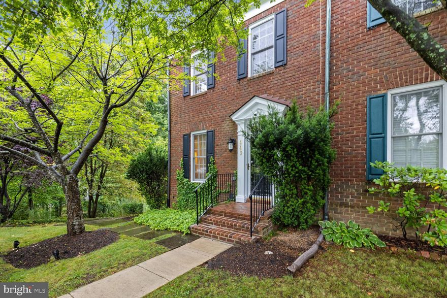 This absolutely incredible 4BR/3.5BA , detached 2 car garage, end-unit townhouse is situated on the largest lot of any other Kentlands townhouse and showcases unparalleled stylish & modern upgrades throughout 3 finished levels. The notable features of the improved kitchen include durable Zodiac quartz countertops with waterfall edge, sub zero refrigerator, sleek stainless steel appliances with 5-burner gas stove and ample 42-inch custom cabinetry. A modernized powder room, herringbone custom hardwood, a cozy dining room, grand living room and a quaint nook complete this level. The hardwood floors continue upstairs and into the stunning master suite with double door entry, soaring 10-ft cathedral ceiling, and breathtaking owners  bath. This spa-like retreat showcases on-trend elegance with a floating dual-sink vanity paired with gorgeous marble tiling, captivating accent wall, seamless glass stall shower and relaxing soaking tub. The owner's suite, as well as the additional two bedrooms on the upper level, come equipped with Elfa closet organizational systems. In addition, all baths in the home have been renovated on the same scale as the owner's bath to include modern floating vanities, marble tiling, chic lighting fixtures, mirrors & hardware. The possibilities are endless in the fully finished walk-out lower level of the home which has a spacious recreation room with & built-in speakers, a legal 4th bedroom with attached full marble bath, walk-in closet, and a laundry room with stackable front-loading washer & dryer. All of this while over looking the lush oversized yard that is picture perfect.   This exceptional, Alfandre-built residence has some of the most desirable exterior features such as a brick front and side façade, wraparound Trex deck with retractable awning, a large manicured yard backing to a private wooded area, and a detached two-car garage. The cedar shake roof is just 7-years young and the HVAC and hot water heater have been recently replaced.  .  Recently added reverse osmosis in the kitchen and whole water filtration system.  All of this and so much more to be seen, while conveniently located across from the Kentlands Clubhouse and recreational facilities.