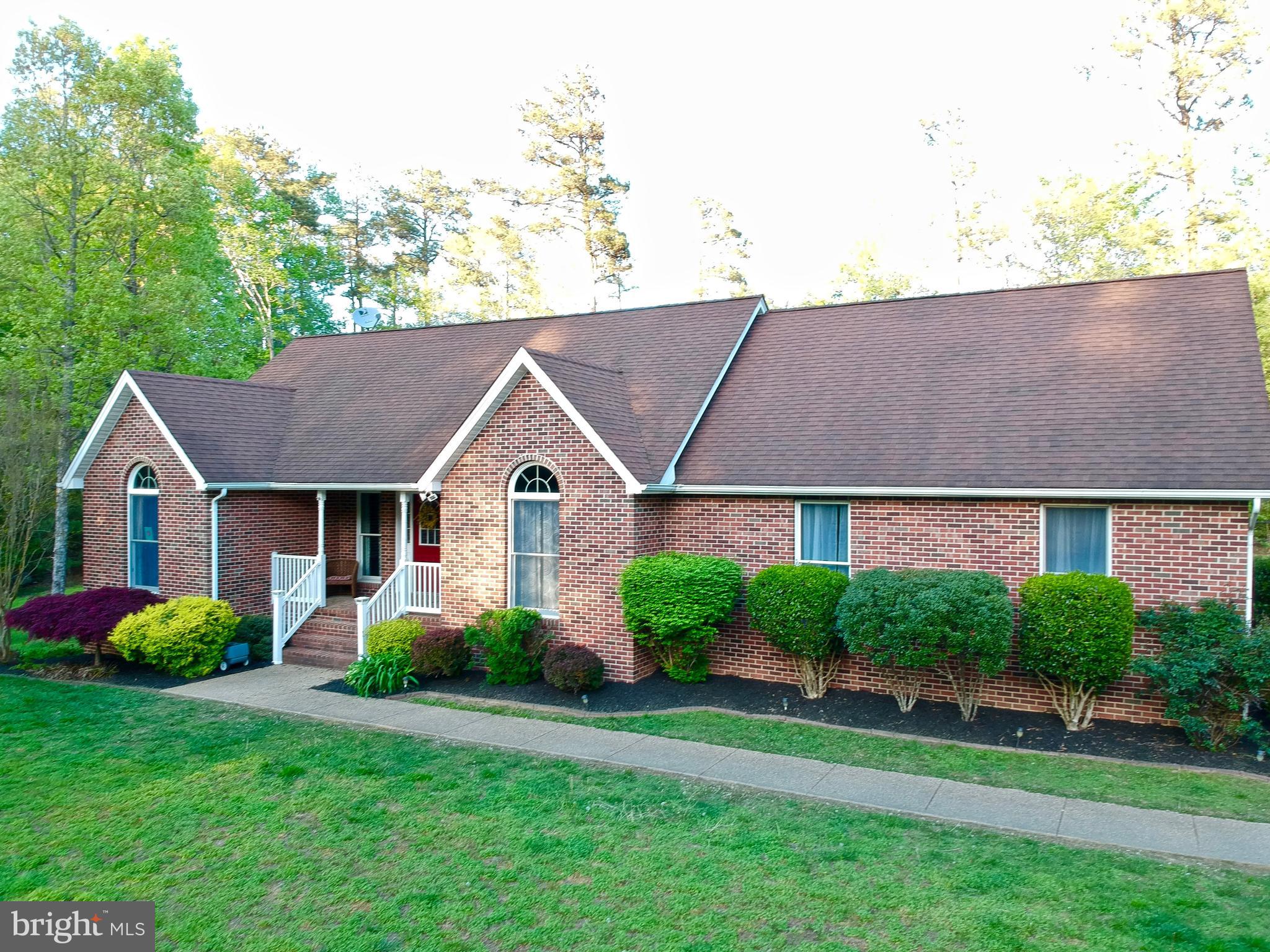 Spacious brick rambler located on quiet level 2.89 acres. Over 3400 sq ft of living space. Beautiful vinyl plank flooring on main level. New ss appliances. Generous Master bedroom with walk in closet & deluxe bath. Tastefully finished lower level with fully equipped 2nd kitchen complete with granite counters & recessed lighting. Lower rec room PLUS additional 3 rooms- den,exercise room, guest room PLUS full bathroom Loads of storage. Central vac. Large deck and fenced in yard!