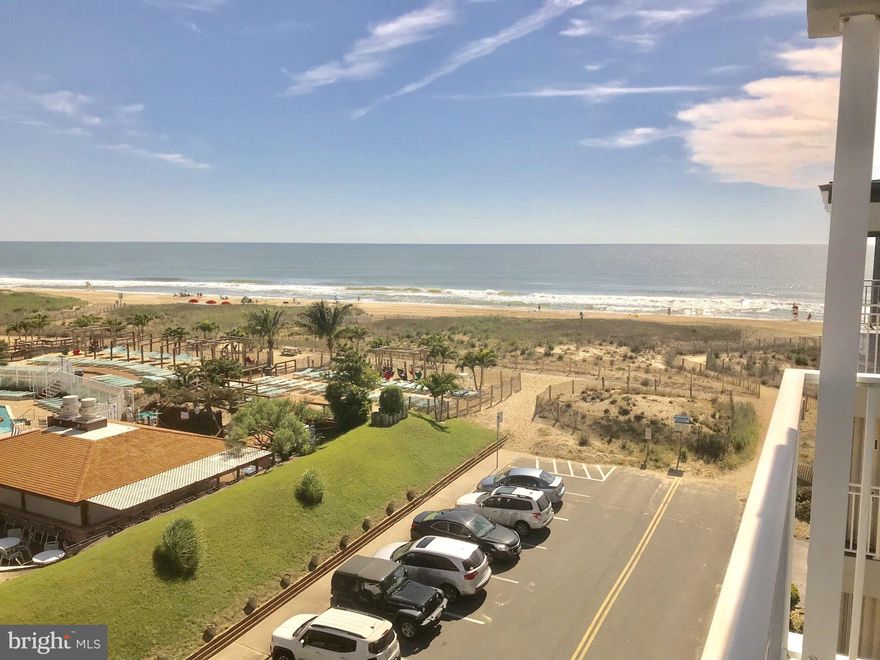 A rare find! Ocean front view at an ocean block price. Top floor, end unit closest to the ocean. Enjoy an uncrowded beach and no high rise buildings to block the afternoon sun. Located in family friendly midtown. Walk to the market, mini golf, shops and many popular restaurants. New AC/heat pump installed in 2017, new flooring in LR and BR and custom drapes. All these features and a pool!