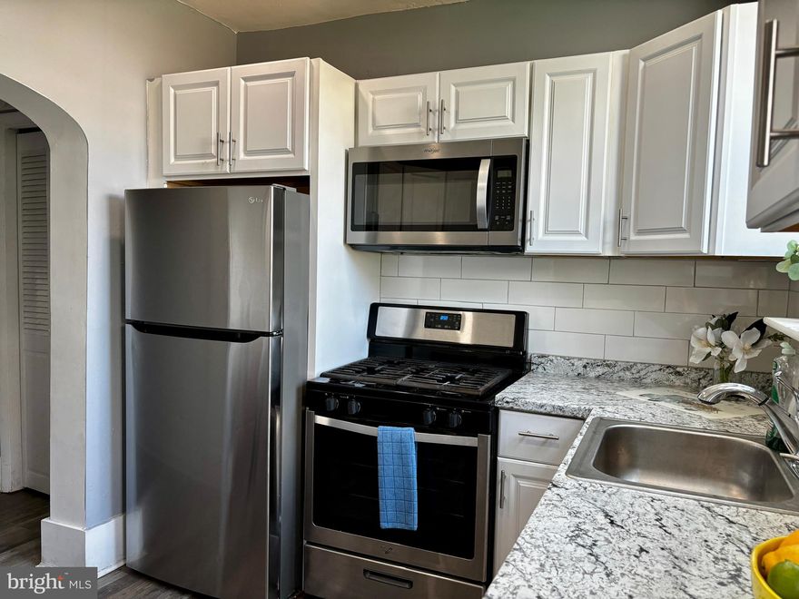 Great location on a fabulous block in Port Richmond for a 3 bedroom town home, 2 full bath (one bath is 1st floor), hardwood floors, primary bedroom has  built in closet organization,  absolutely fantastic kitchen with stainless steel appliances, granite countertops,  on a lovely block, close to Campbell Square, Planet Fitness, Splash  water park for kids, Wawa, Dunkin Donuts, park with morning yoga just a block away and great restaurants a short walk away! Unfinished basement has wonderful potential for extra added space with walkout entrance. One year home warranty is included! Easy short commute to center city, New Jersey or PA turnpike via I-95! Public transportation is available.