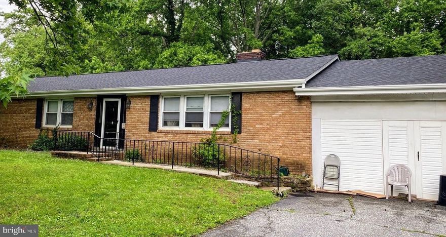 4 Bedroom Rancher.  Rare Find !  Fixer Upper.  Huge yard.
