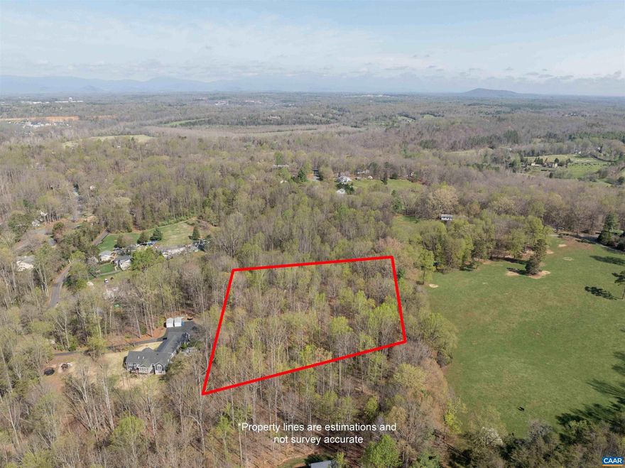 Lovely building lot located just a few miles north of Pantops off Rt. 20, convenient to Martha Jefferson Hospital, UVA, Downtown Charlottesville, and I-64  Very private setting with slightly rolling topography that would accommodate a walk out basement.  No HOA restrictions.  Perks for a 5 bedroom conventional septic system.  Please do NOT visit without an appointment as the property is accessed by a shared driveway. The adjacent lot consisting of 3.43 acres is also available.  See MLS 675383.
