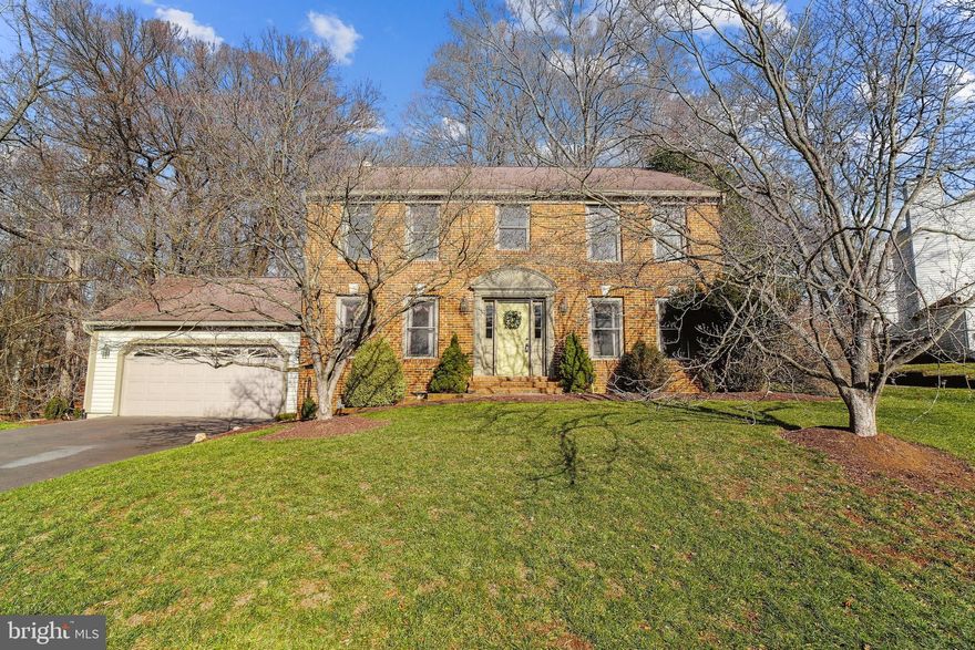 Welcome Home to this wonderful 5 bedroom (+1st floor office), 3.5-bathroom colonial, a true gem and the perfect blend of comfort, size, and convenience. Meticulously maintained by its original owners, this home has never been on the market before, and it shows pride of ownership in every corner. Situated on a dead-end street, you’ll enjoy tranquil wooded views and a prime location just steps from the Matthew Henson Trail. As you step inside, you’re greeted by a welcoming foyer that sets the tone for the rest of the home. The main level features a spacious den/office, ideal for remote work or study, and a large, open kitchen designed for both functionality and style. Upgraded stainless-steel appliances, plenty of counter space, and a large, charming breakfast area flow seamlessly into the family room, complete with a cozy wood-burning fireplace—perfect for relaxing evenings or entertaining.
Start your day with a cup of coffee while gazing out over the peaceful wooded landscape from the kitchen or the expansive two-level deck. Whether you're hosting a summer barbecue or enjoying a quiet evening under the stars, the outdoor space is sure to impress with its privacy and natural beauty. The main floor also offers a formal dining room, living room, and convenient powder room. Upstairs, the generous primary suite is your own private retreat, featuring an attached bath and a large walk-in closet. Three additional spacious bedrooms and a second full bath provide ample space for family and guests. The fully finished lower level adds even more living space with a 5th bedroom, a third full bath, a massive family/rec room, and a custom wet bar area—ideal for entertaining or unwinding. There's also plenty of storage space to keep your home organized and clutter-free. The home also boasts a two-car garage and a large driveway with plenty of off-street parking. A new gutter system was installed in 2023 for added peace of mind.

This home is NOT part of an HOA—but if you choose, you can opt into the community association for just $400/year, which grants access to fantastic amenities including a pool, pickleball and tennis courts, movie nights, concerts under the pavilion, community yard sales, and more!

For commuters, this home is a dream, with easy access to the Glenmont Metro Station (approximately 3 miles), Metro Bus, Ride-On, and the ICC/MD 200. You’re also just minutes away from schools, fitness centers, golf courses, shopping, dining, and recreational parks—everything you need is right at your doorstep.
Don’t miss out on this incredible opportunity to own a home that has been loved and cared for, offering both peaceful living and unbeatable convenience. Schedule your tour today!