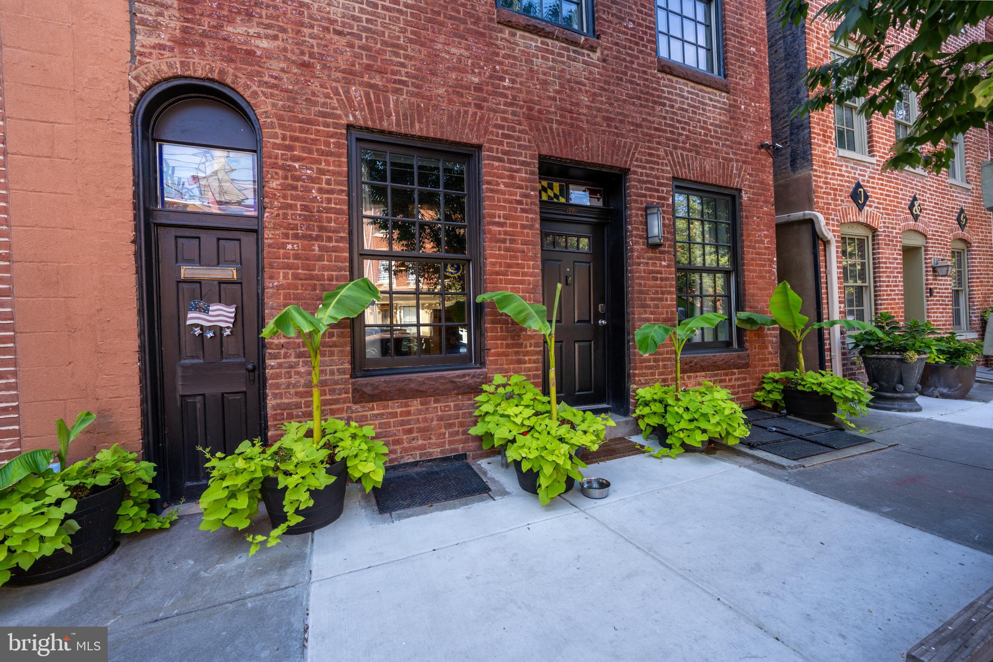 Extraordinary Space, Unbeatable Location – The Best of Fells Point Living
Welcome to 840 S Bond Street—where historic charm meets modern scale in the heart of Fells Point. Tucked just a half-block from the waterfront and steps from the best of Baltimore’s beloved waterfront neighborhood, this expansive four-level residence offers an impressive footprint rarely found in city living.
Offered fully furnished, this home is move-in ready and ideal for tenants seeking a smooth and stylish transition. Whether you’re relocating, or downsizing from the suburbs, 840 S Bond Street delivers the ultimate turnkey experience.
Inside, you'll find over 4,100 square feet of thoughtfully designed living space across four floors, including a full lower-level billiards room, multiple gathering areas, and four spacious bedrooms. The main level wows with soaring ceilings, an open-concept kitchen anchored by an oversized island, and sun-filled living and dining areas that flow seamlessly for entertaining. Upstairs, the luxurious primary suite spans the width of the home with a spa-inspired bath and custom walk-in closet. Additional bedrooms and baths provide comfort and flexibility for guests, family, or a home office.
What truly sets this home apart is its secure off-street parking—a rarity in Fells Point. Enjoy the convenience of a private garage and gated parking pad, all tucked behind a fenced courtyard for added peace of mind.
Step outside and you're just moments from everything that makes this neighborhood special: Belgium block streets, award-winning restaurants, cozy cafes, boutique shops, and vibrant nightlife. The waterfront promenade is less than a block away, perfect for morning jogs or sunset strolls. Whole Foods, Harbor East, and Canton are all just minutes away—placing you at the center of Baltimore’s most desirable lifestyle.
If you’re seeking space, security, and true walkability in one of the city’s most storied neighborhoods, 840 S Bond Street delivers in every way.