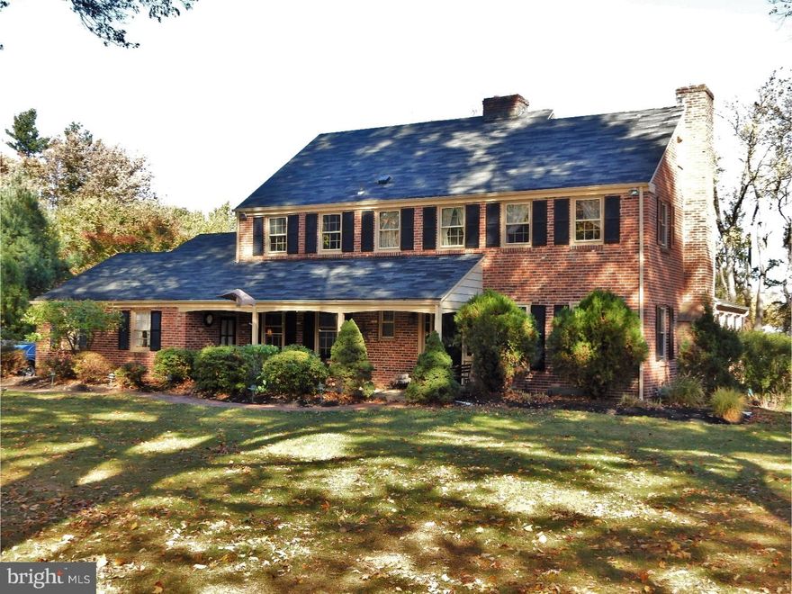 Don't miss the opportunity to live in this Classic brick 2-sty Colonial on level 1 acre lot in sought after Canterbury Woods in Easttown Township.  Enter from the curved brick walkway to the covered front porch and into the slate foyer. The family room addition ((2006)exudes warmth with sunlight streaming thru many windows, radiant heated floor and views of a private, tranquil rear yard.  The kitchen (2011) boasts granite counters, solid Cherry cabinets with self close drawers, double oven, hand scrapped Teak floors and large island with seating for 4. Adjacent is the charming dining room with gas fireplace and sliders to large paver patio (2006) plus enclosed hot tub perfect for any season. The spacious living room has refinished hardwood floors, gas fireplace and sliders to the family room addition making it easy to entertain large groups.  The den with hardwood floors, originally the dining room, is a comfortable quiet space to relax and chill. A convenient laundry with utility sink and door to two car garage with openers plus an updated powder room with marble floors and new vanity complete the first floor.  The second floor has 4 spacious bedrooms, large closets, hardwood floors and a walk-up attic which could be converted to a 5th. The master suite has his and hers closets, hardwood floors and master bathroom with shower. The hall bath has been renovated (2016) with new fixtures, vanity, tub and shower. The unfinished walkout basement could be finished for additional space.  There is a newer(2008)top of the line "Buderus" 3-zone gas furnace with humidifier, newer AC (2013) and newer gas hot water heater.  There is a central stereo system which also includes the garage and the patio area. All this within the prestigious award winning T/E School District, Beaumont Elementary, T/E Middle School and Conestoga High School. Walking distance to Upper Main Line "Y" and the 27 acres of walking trails and streams of Sharpes Woods Preserve. Berwyn Hilltop Park, the Paoli Septa/Amtrak rail line (1.7 mi.), numerous retaurants and shops are just a short drive!  NOTE: Square footage includes family room addition. More Photos coming Friday!
