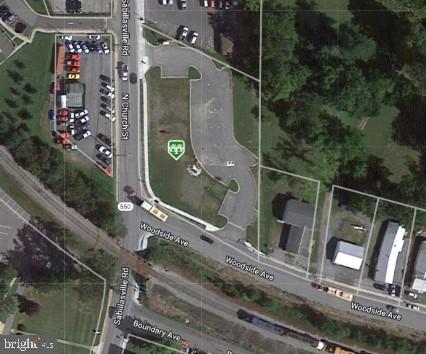 .98 of an acre zoned General Business which allows for lots of possibilities including but not limited to Apartment Unit attached to commercial structure, retail, food store, grocery, hardware, bank, barber shop, beauty salon, professional offices, automotive, fast food, restaurant, etc! High visibility site at the corner of N. Church St and Woodside Ave. with up to 35 parking spaces (as currently designed) . Water and Sewer tap fees were paid for 6 units in 2005 (buyer to confirm with the Town of Thurmont). Storm water infastructure in place (buyer to confirm with Town of Thurmont and County that it meets current standards).