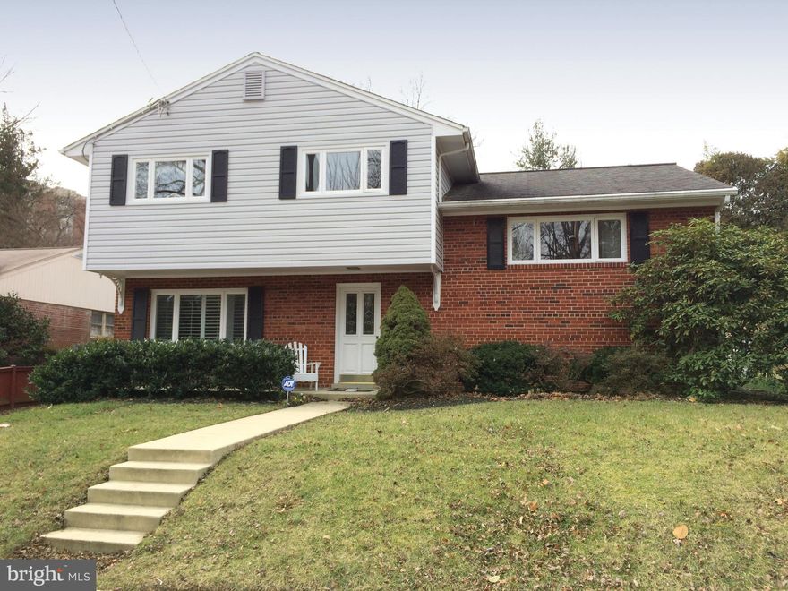 Meticulously kept Split-Level home in highly sought-after BCC school cluster. Countless features incl: a welcoming foyer; 3 rooms of storage crawl space; cozy family rm w/ wood-burning FP; fully equipped laundry room; eat-in kitchen w/ SS appliances and granite counters; hwd floors; lots of natural sunlight; stunning wooden deck & an expansive, manicured backyard. Within steps of Metro, DC & 495.