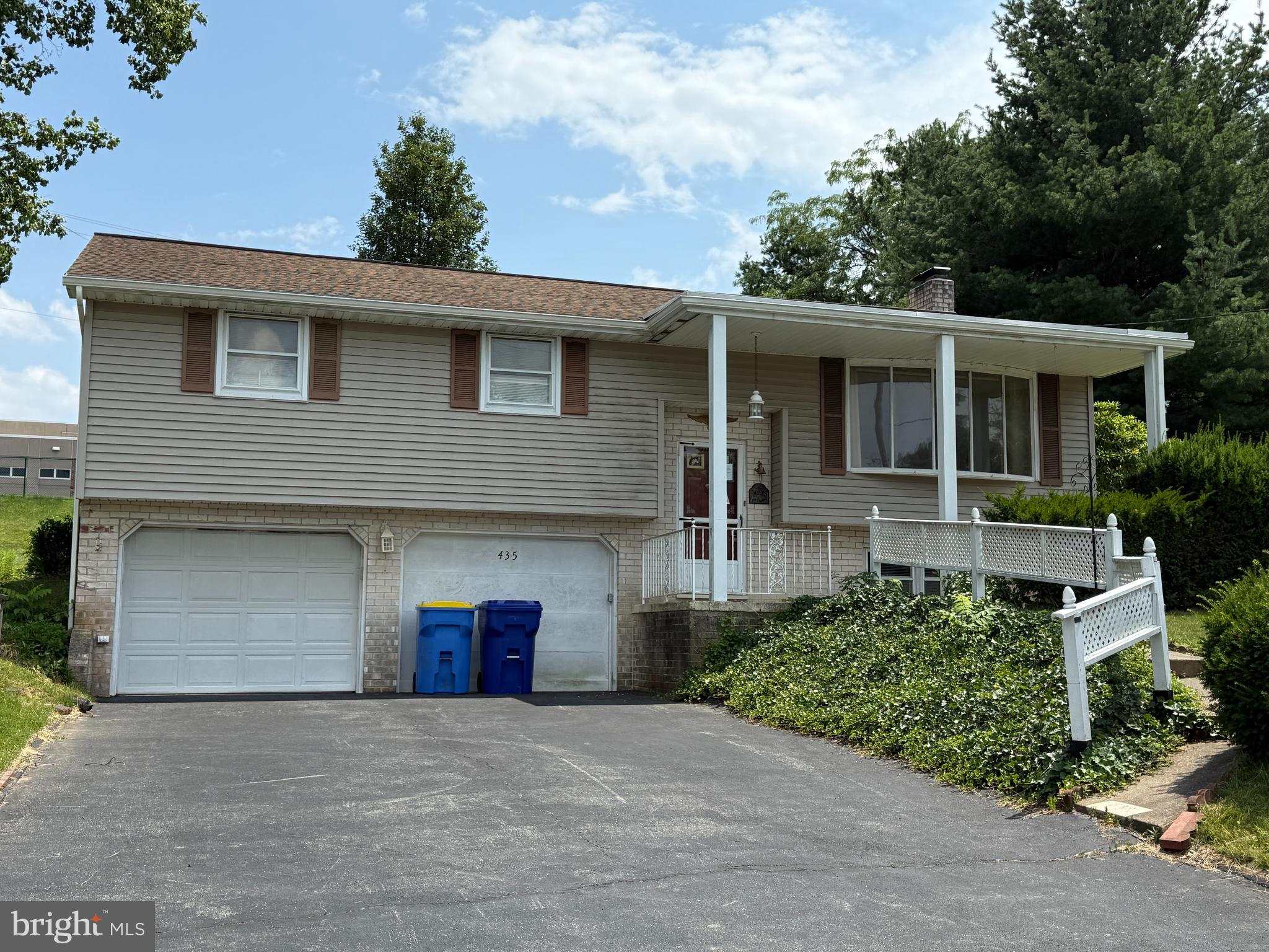 Beautiful opportunity to own this spacious bi-level located within walking distance of schools and more - Great yard with shed - Finished lower level rec room with fireplace, laundry room, den and full bathroom - Upper level offers a large living room, dining room, kitchen, another rec room, three amply sized bedrooms and another full bathroom - This home is ready to go with gas heat and central a/c for these hot summer days! Take a good look before it's too late!!!