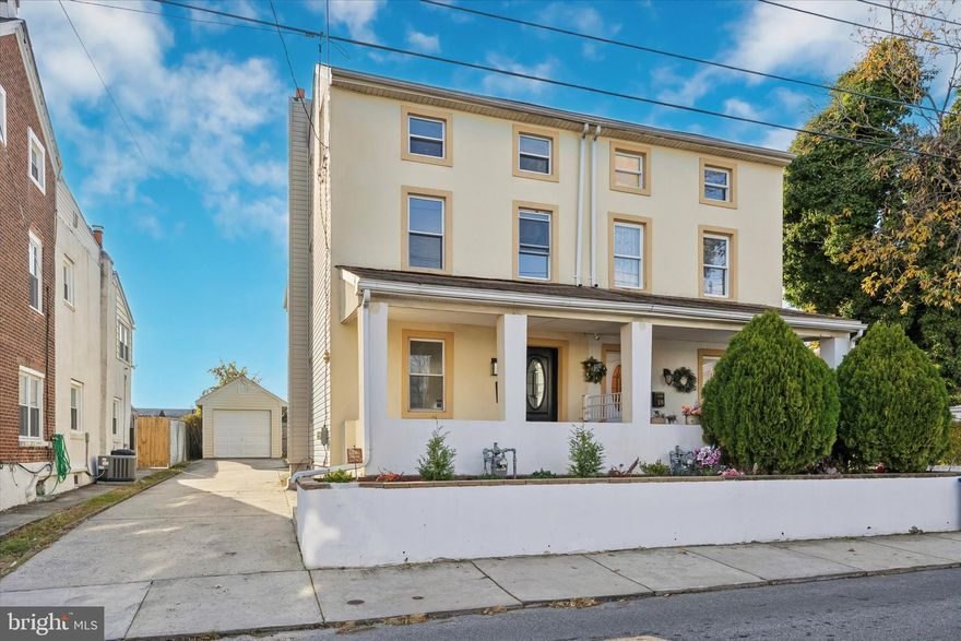 Welcome home to this updated  and expanded twin in Clifton Heights! This home combines a ton of features not often found in the sub $300k market. Oversized detached garage, central air, quartz counters, new white kitchen cabinetry with soft close doors and drawers, new appliances, 2 full baths, and over 1,500sf! Entering the  home from the front porch with hand laid ceramic tile, the bright and sunny living room welcomes you in with hardwood floors and lots of windows. Continuing on, you enter the open concept kitchen/dining room. This is a huge area that is perfect for entertaining. This area also has a back door to the patio; which allows the perfect setup for summertime hosting.  Upstairs on the 2nd floor there is a large primary room in the rear, a full hall bath, front bedroom, and then up to the  3rd floor with large versatile bedroom and full bath. Well laid out with lots of space and features, come check this home out today!