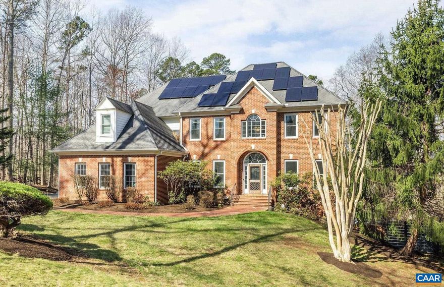 Set on just over four picturesque acres in an established neighborhood off Garth Road, this attractive brick home offers a rare blend of privacy, space, and convenience?all within the highly sought-after Ivy Elementary school district. A light-filled interior welcomes you with flexible living spaces designed for both everyday living and entertaining. The updated kitchen features light cabinetry, stainless steel appliances, new quartz countertops and backsplash, and an easy flow to the main living areas. The main level also includes a bedroom with full bath access and a private office. Newly installed hardwood floors span the second level, with the main level refinished to match, creating a cohesive and updated feel throughout. The finished terrace level offers exceptional versatility, complete with a full kitchen?perfect for an in-law suite, guest quarters, or extended stays?as well as a spacious rec room and dedicated fitness area. Outdoor living is equally inviting, with significant site work completed to create an expanded patio off the large rear deck, all overlooking the beautiful, private grounds. A 3-bay garage provides ample space for vehicles, storage, or hobbies.,Quartz Counter,White Cabinets,Wood Cabinets,Fireplace in Family Room,Fireplace in Rec Room