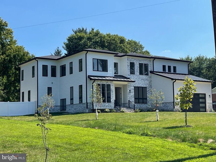 New construction home Just completed.
Welcome to this beautiful contemporary new home. Upon entering, you will be impressed by an open and spacious floor plan. Main level great for entertainment, abundant natural light as it opens up to a screened porch with direct access to a large, level, fenced in backyard. Main level en-suite bedroom with a full bath. Mud room, two car garage with a large drive way. Second floor offers 4 bedrooms each with its own bath and walk in closets, sitting area , and large laundry room. Finished basement with wet bar, bonus room, full bathroom, and bedroom.  Among the features are Anderson windows, quartz countertops, frameless shower doors, 10 and 9 ft. Ceilings, Jenn air appliances and many other features. Great location close to walking trails, shopping centers, lifetime gym and a short distance to metro station Vienna, fairfax hospital, and major commuter roads including 66, 50.