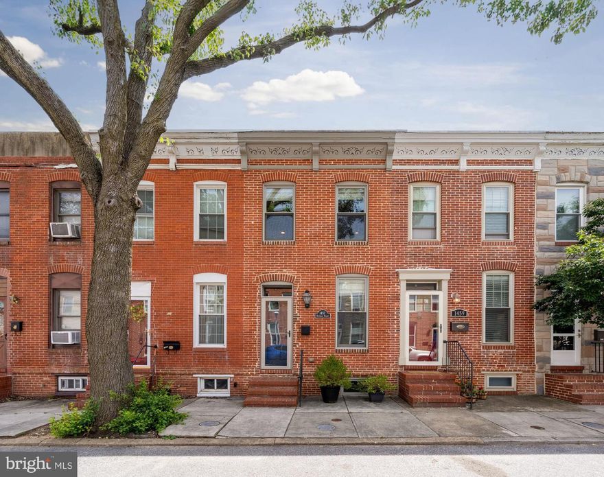 Welcome to 1457 Reynolds St, a charming rowhome nestled in the vibrant neighborhood of Locust Point in Baltimore, MD. This delightful residence offers a generous 1,884 square feet of living space, thoughtfully designed to accommodate modern living while retaining a unique historical charm.

The home boasts three spacious bedrooms and three full bathrooms, providing ample room for relaxation and privacy. The open-concept living area is perfect for entertaining guests or enjoying quiet evenings at home. Natural light floods the space, enhancing the warm and inviting atmosphere.

The kitchen is well-appointed with modern finishes and stainless steel appliances, plus an island for extra seating. Each bedroom is a serene retreat, featuring ample closet space and comfortable layouts that invite rest and rejuvenation.

Parking is a breeze with private parking, a coveted feature in the city that adds a layer of convenience. Beyond the parking pad is a wide alley, making coming home even easier. Don't forget about your tiered rooftop deck to enjoy even more of the great outdoors, fireworks, and more!

This townhouse combines historical allure with contemporary comforts, making it a perfect residence for those seeking a balance of style and functionality. Located in a dynamic neighborhood, residents enjoy easy access to local restaurants, parks, and I-95, blending urban excitement with a cozy community feel.

Embrace the opportunity to make this exquisite townhouse your new home and experience the vibrant lifestyle Baltimore has to offer. Reach out today for more information or to schedule a viewing.