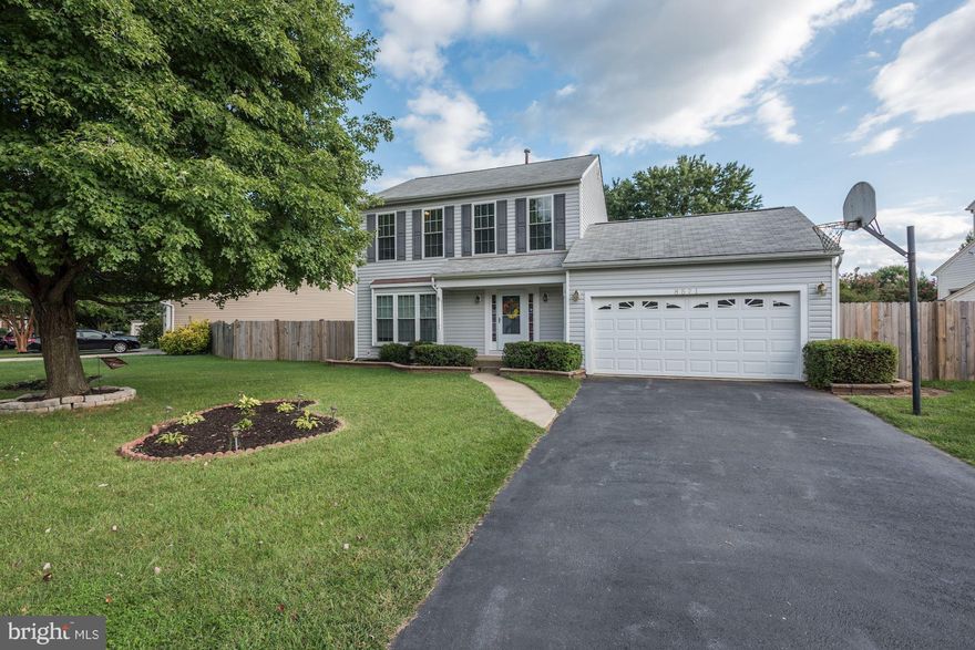 LOCATION, LOCATION, LOCATION. Perfectly situated close to historic Manassas City. Close to shopping, <1 mile to the VRE, close to commuter routes 28 & 66. Huge & private backyard with spacious deck. Hardwood floors in foyer. Granite counter tops in kitchen, newer stainless steel refrigerator. Fully finished basement with full bathroom & den/bedroom. 2-car garage w/ built-in shelves and cabinetry.