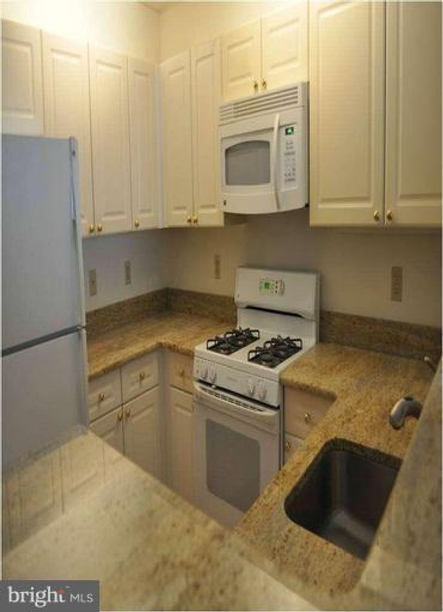 **PENTHOUSE 2 LEVEL CONDO: 2BR + DEN (possible 3rd BR).  2 Full Baths, Large Walk-in Closets. Vaulted Ceilings. Granite in Kitchen, GAS Fireplace. LOCATION, LOCATION LOCATION, LOCATION!!! In the heart of Tysons Galleria and Tyson s Corner.  1 Garage Spot, 1 Resident Parking Spot & 2 Visitor Parking Spots.  Easy access to Rt 495, Rt 66, Dulles Toll Rd.  METRO!!!