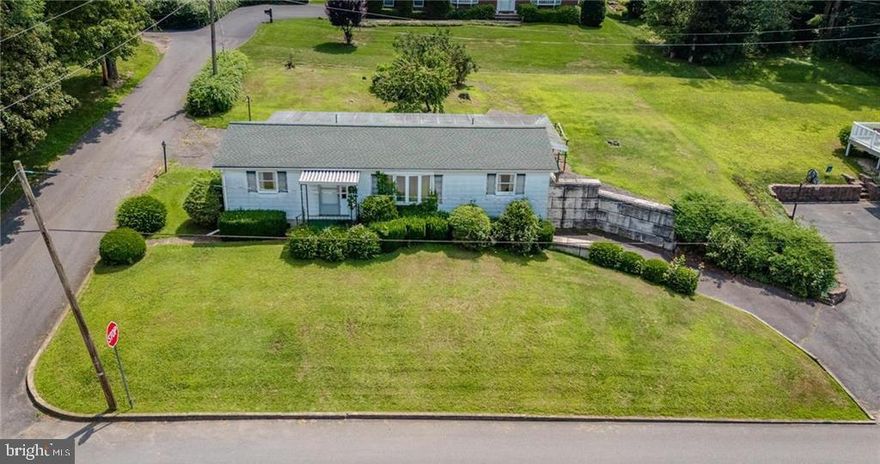 Charming 3 Bedroom Ranch with Garage, Carport & Great Potential!  This affordable 3 bedroom 1.5 bathroom ranch home offers a functional layout and great bones - just waiting for your personal touch!  The main floor features a bright and inviting living room with a large bay window that fills the space with natural light along with original hardwood flooring throughout portions of the home.  Enjoy a cozy eat in kitchen and separate dining room.  All three bedrooms are located on the main floor, along with a full bathroom, making this a perfect one level living set up.  Downstairs to lower level includes a partially finished basement, workshop area, half bathroom and tons of storage.  This home also features an attached 2 car garage and a covered carport that doubles as a relaxing outdoor covered patio or entertaining space.  Whether you're a first time home buyer, investor, or someone looking to update a home and make it truly your own, this is a fantastic opportunity!  Schedule your showing today and bring your vision to life!