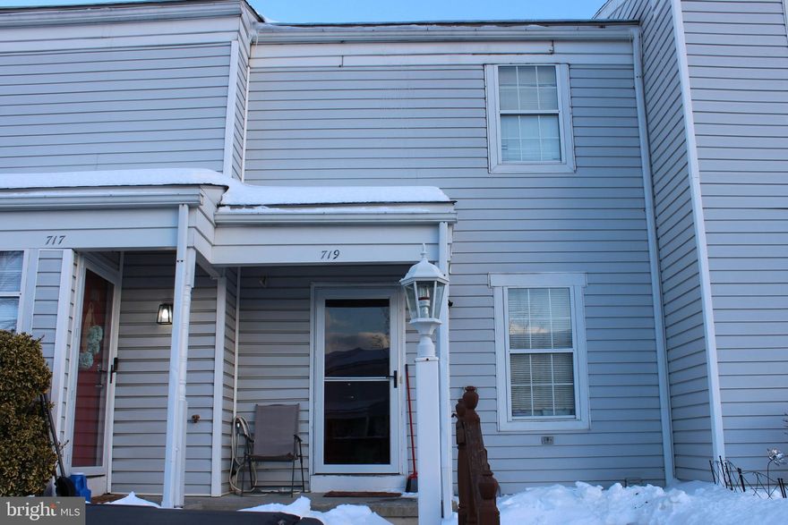 Location! No Shoveling! Instant equity! This 2 bedroom, 2.5 bathroom home in Walnut Villas boasts a great opportunity to buy, live, update, and realize the benefits of home ownership, as you make the home your own and build long-term equity. Priced below similar homes in the area to allow you that freedom & flexibility to update, as you see fit, not buying someone else's idea of design. Full basement offers laundry area, mechanicals, and a large space for storage, or finishing off for more livable space! Private rear deck for grilling, hanging out or relaxing. Covered front porch to protect deliveries from most weather. Condo Association handles exterior maintenance, lawn care, trash, snow removal.