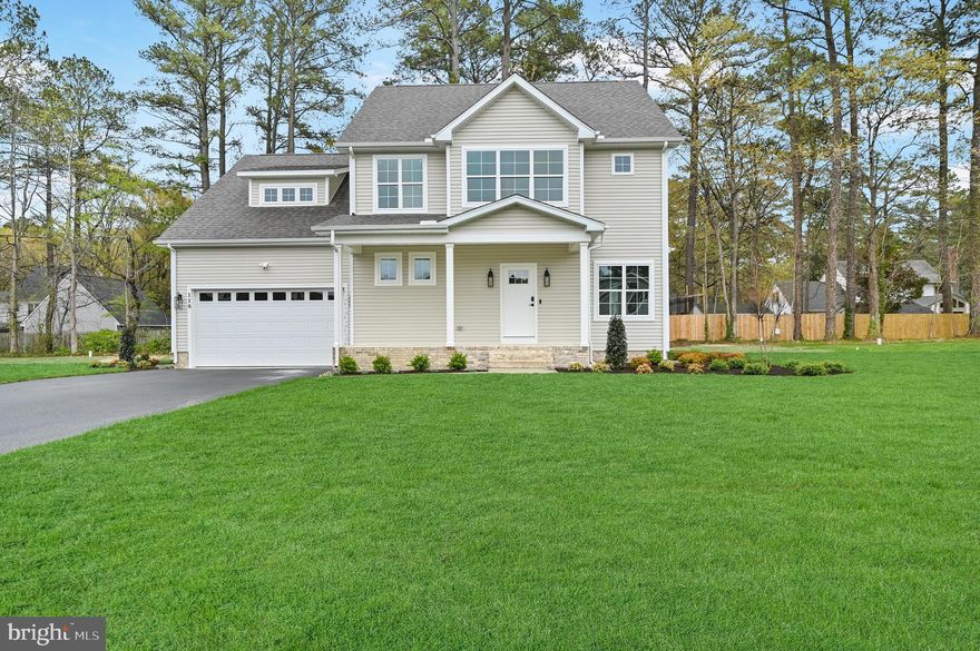 This beautifully designed 4-bedroom, 2.5-bathroom home in Fruitland offers a spacious open floor plan perfect for modern living. The kitchen is a chef’s dream, featuring a large island, sleek quartz countertops, Fabuwood cabinets with self-closing drawers, stainless steel appliances, and a stylish tile backsplash. The main level also includes a convenient half bath and utility room. Upstairs, the master suite provides a private retreat with a luxurious master bath, complete with dual vanity sinks, a full tile walk-in shower, and a generous walk-in closet. Three additional bedrooms share a full bath with a tile tub-shower combo. Enjoy the outdoors on the TimberTech deck, perfect for relaxing or hosting guests. As well as an attached two car front facing garage. Additional builder upgrades include CertainTeed siding, IKO Cambridge shingles, MI V3000 series windows, insulated garage door, black top driveway, and a Ring Home Package. The trim package is upgraded to a stylish Craftsman design, and the home features durable LVP flooring with a lifetime warranty, wood shelving in closets and pantry, and tile accents throughout. This home combines modern style, functionality, and quality craftsmanship. Don’t miss the opportunity to make it yours—schedule a tour today!