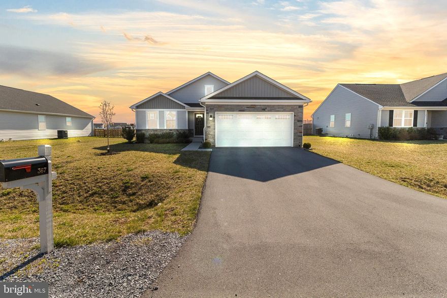 This beautiful home is like new!!  It was built in 2020 and has been immaculately cared for since!  The owners chose almost every upgrade available when having this home built, including having a separate formal dining room for all your holiday dinners!  This rancher features three spacious bedrooms and two full bathrooms.  The full, unfinished basement has roughed in plumbing  ready for the new owners to double the living space!  The backyard  has a custom poured patio and beautiful decorative metal fencing.   The property backs to the common area featuring a park and dog park!!  Enjoy cookouts in your backyard oasis without  any neighbors behind you!