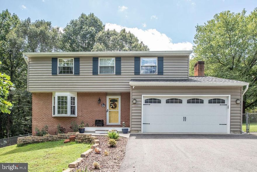 Beautiful UPDATED 4 bedroom 2.5 bathroom home in Stafford Virginia on almost 2 acres! This home is a GEM! Newer roof, siding and HVAC. Meticulously maintained. Updated kitchen w/ granite countertops. Enjoy your family room, dining room and living room with fireplace. Upstairs boasts a master bedroom with a master bathroom! and 3 additional bedrooms.  Do you enjoy having an amazing yard? Enjoy your Deck that overlooks the large fenced in backyard with plenty of trees! Need extra storage space or a wood working shop? Take advantage of the basement and shed in the backyard. There is so much to tell, come and see!