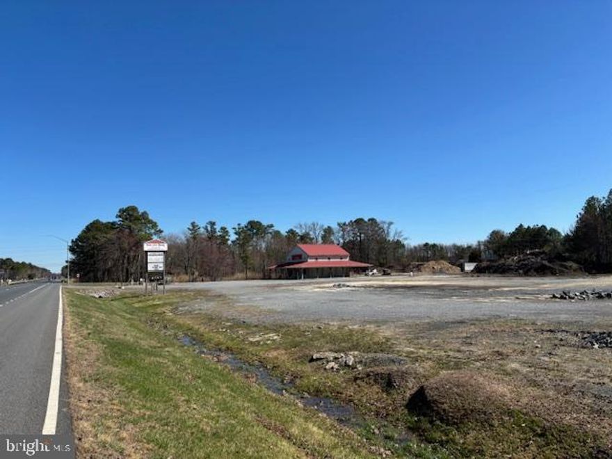 Commercial zoned property consisting of 7.6 +/- acres with direct Rt. 50 access. Features include over 500 ft of premier road frontage along with three access points for traffic including a back entry way off of Chateau Dr. Improvements encompass over 3,600 sq ft inside of the metal building including seven service doors and six separate private offices. This property is located only three miles outside of city limits and in the general business district on the Dorchester County Md 2021 zoning map providing multiple business possibilities.

BUYER'S RESPONSIBILITY TO PERFORM DUE DILIGENCE REGARDING PROPERTY LOCATION, USE, RESTRICTIONS, AND TAXES.