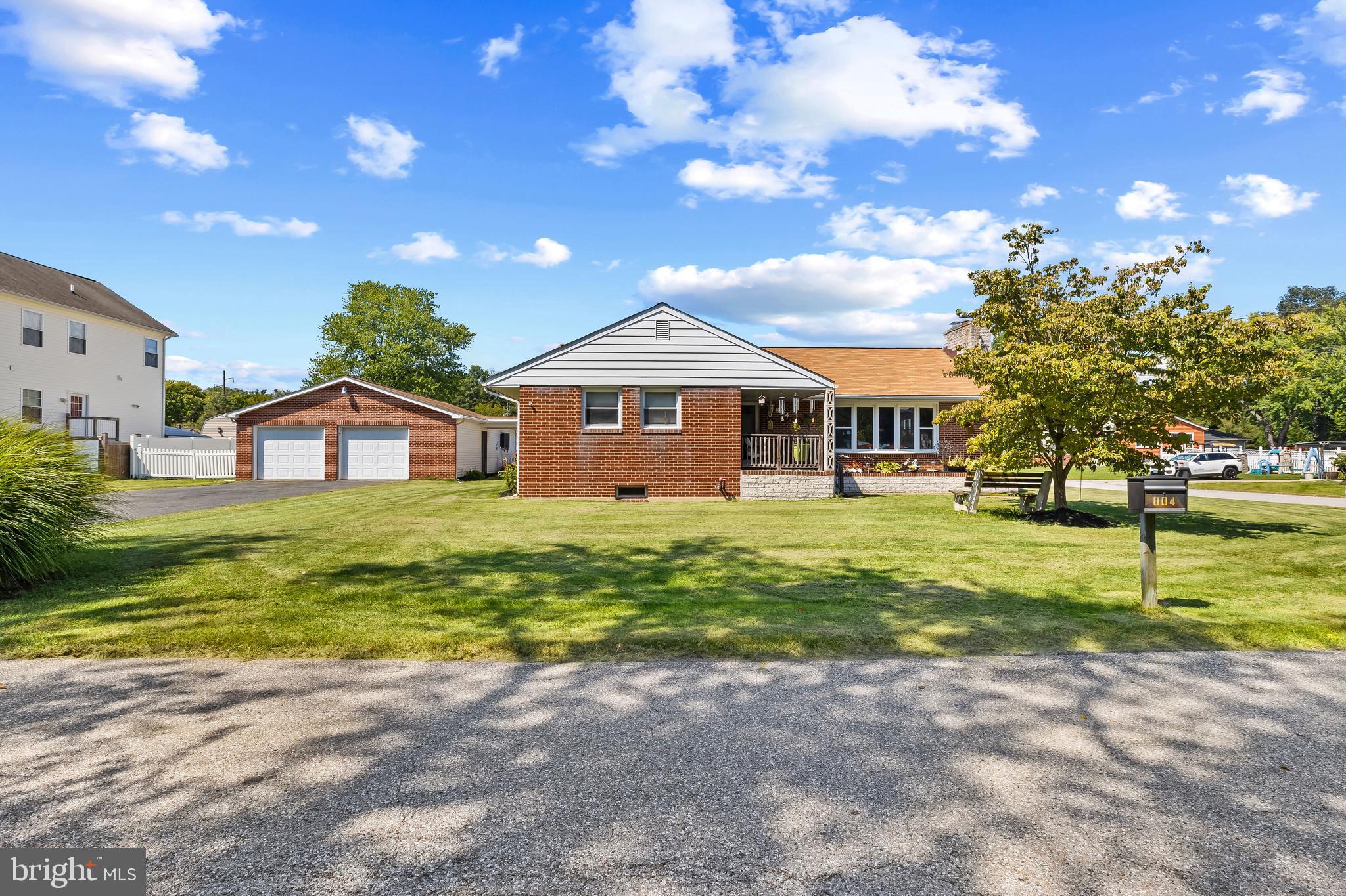 **JUST LISTED**Welcome to 804 Pineview Place!
This stunning property sits on a spacious corner lot
and offers double driveways, a carport, and massive 4-car garage-perfect for car
enthusiasts, hobbies, or a dream workshop as well as upper level storage. Inside this
classic red-brick rancher, you'll find a warm and inviting living room featuring a
beautiful bay window that fills the space with natural light, along with a cozy pellet
stove for chilly evenings. The dining room, surrounded by windows, flows seamlessly
into the kitchen, creating an open layout ideal for everyday living and entertaining.
The large, well-appointed kitchen boasts ample cabinet and counter space, granite
countertops, Jenn-Air range, recessed wall oven and microwave, and even room for a
coffee station. The entry room doubles as the laundry area. A convenient pantry is
tucked behind the kitchen. This home offers two generously sized bedrooms and two
full baths, including a private en suite in the primary bedroom. The expansive lower
level provides endless possibilities-whether you envision a workout room, movie room,
or family gathering space. The attic features a convenient pull-down attic stair. Step
out to the sunporch for year-round relaxation, or head to the backyard-the true
showstopper of this home. The fenced yard features a sparkling 18'x36' in-ground pool
surrounded by an upgraded patio area that is specially coated with a lifetime
transferrable guarantee, plus a gazebo that provides shade and the perfect setting for
summer entertaining as well as a large double-door shed with electric and lights. The
oversized 4-car garage is a dream come true, offering a dedicated bathroom, separate
electric panel, and plenty of space for multiple vehicles, projects, or a full workshop
setup, and includes a pull-down attic stair. Updates include roof (2018), pool liner
with Pentair Quad DE filter and pump (2018), water heater (2018), fuel oil tank
(2019), and backyard concrete (2023) with polyurea basecoat and polyaspartic
topcoat (2024). Do not miss the chance to own this unique property that combines
classic charm, modern updates, and incredible outdoor living! (*This lot of 2 parcels
is a combined 18,750 square feet (.43 acre). The tax record acreage is inaccurate.*)