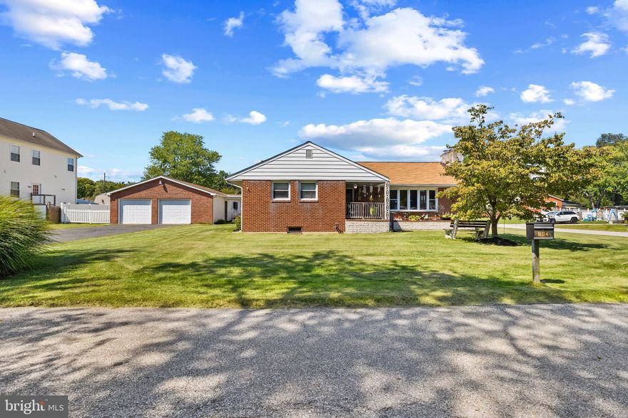 **JUST LISTED**Welcome to 804 Pineview Place!
 This stunning property sits on a spacious corner lot
and offers double driveways, a carport, and massive 4-car garage-perfect for car
enthusiasts, hobbies, or a dream workshop as well as upper level storage. Inside this
classic red-brick rancher, you'll find a warm and inviting living room featuring a
beautiful bay window that fills the space with natural light, along with a cozy pellet
stove for chilly evenings. The dining room, surrounded by windows, flows seamlessly
into the kitchen, creating an open layout ideal for everyday living and entertaining.
The large, well-appointed kitchen boasts ample cabinet and counter space, granite
countertops, Jenn-Air range, recessed wall oven and microwave, and even room for a
coffee station. The entry room doubles as the laundry area. A convenient pantry is
tucked behind the kitchen. This home offers two generously sized bedrooms and two
full baths, including a private en suite in the primary bedroom. The expansive lower
level provides endless possibilities-whether you envision a workout room, movie room,
or family gathering space. The attic features a convenient pull-down attic stair. Step
out to the sunporch for year-round relaxation, or head to the backyard-the true
showstopper of this home. The fenced yard features a sparkling 18'x36' in-ground pool
surrounded by an upgraded patio area that is specially coated with a lifetime
transferrable guarantee, plus a gazebo that provides shade and the perfect setting for
summer entertaining as well as a large double-door shed with electric and lights. The
oversized 4-car garage is a dream come true, offering a dedicated bathroom, separate
electric panel, and plenty of space for multiple vehicles, projects, or a full workshop
setup, and includes a pull-down attic stair. Updates include roof (2018), pool liner
with Pentair Quad DE filter and pump (2018), water heater (2018), fuel oil tank
(2019), and backyard concrete (2023) with polyurea basecoat and polyaspartic
topcoat (2024). Do not miss the chance to own this unique property that combines
classic charm, modern updates, and incredible outdoor living! (*This lot of 2 parcels
is a combined 18,750 square feet (.43 acre). The tax record acreage is inaccurate.*)