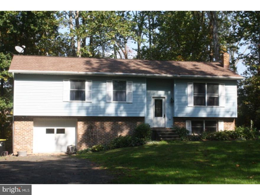Wonderfully secluded setting.  Privacy on all sides.  1/4 mile walk to State Gamelands.  Surrounded by forest and fields!  Could be a hunter's haven!  This bi level is ready to move right in.  The lower level is rough plumbed for a bath and ready to be finished to your liking.  Lower level has a coal stove with auto feed and thermostat.  Affordable price and appliances included.  Gas range will be replaced with stainless electric range.  Large red washer and dryer do not remain.  White dryer will remain.  Well pump and electric hot water heater new September 2012.  Get your offer in today!  Mailing Address Continued: New Ringgold  Color: Blue  Amp: 200