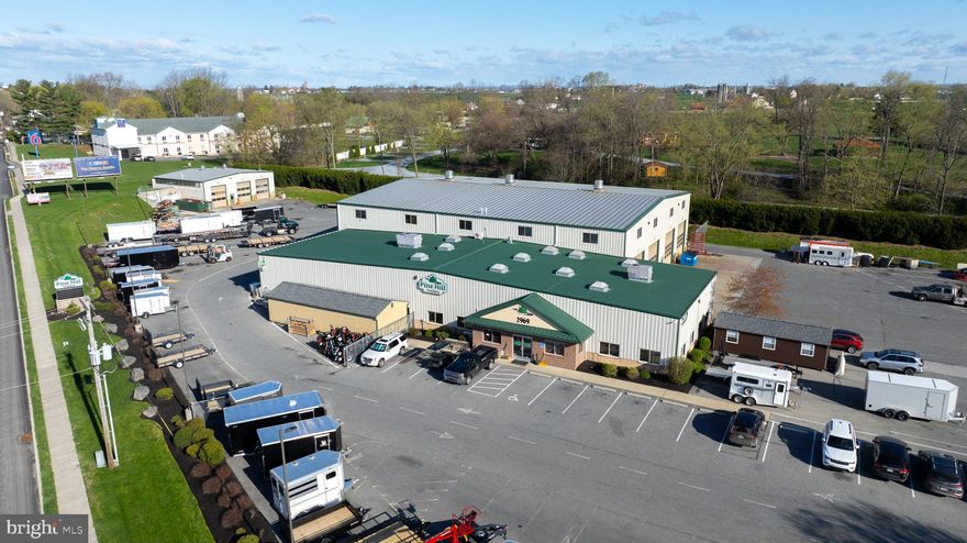 2975 Lincoln Highway East (Tax Account #310-04516-0-0000) also included in sale price.  Property is currently production and sales facility for Pine Hill Trailers, which is relocating.  Site contains 3 warehouses and 1 house.  Area for trailer parking, outside storage or additional building capacity.  Great visibility along Route 30.