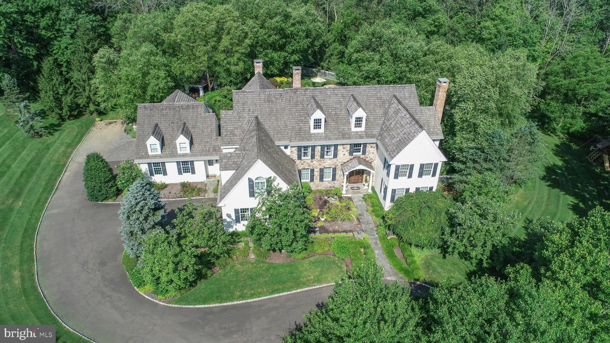 This stunning residence will dazzle and delight you! It has been renovated and expanded with the finest finishes from the foyer and living room to the extraordinary kitchen, completed by an idyllic setting of gardens, terraced pavilion, pool and pool house. With exquisite details and finishes throughout, a tour of this home will NOT disappoint. Our first floor features a sun filled gracious floorplan starting with a handsome study, an elegant formal living room, dining room and just the right combination of formal and informal spaces. Add to the 1st floor tour an additional office and dramatic 2 story great room with a multitude of windows all framing the raised hearth fireplace. Our awe inspiring kitchen was artfully designed and created by Jim Hamilton, trimmed with sinker cypress wood brought up from the bottom of the Mississippi River, reclaimed cabinetry, stone flooring from Jerusalem (radiant heated), quartz counter tops and the most creative gourmet pantry you have ever seen. A guest/Au Pair suite was added with its own private stairwell very secluded from the remaining 5 bedrooms, just perfect for out of town guests. The master suite features a serene sitting room, a super shower luxury bath and a generous sized customized walk in closet. The lower level of this amazing property brings European old-world charm to life before your eyes! The Irish Pub is an actual re-creation of a tavern in Dublin Ireland known as the Cellar Bar . It s beautiful millwork, wainscoting, limestone floor and its masonry walls are simply amazing reproductions of this historic watering hole in Emerald Isle. Add a billiards room, a theater room, a gym and a full bath plus sauna to the lower level then step out to its private terrace and enjoy your cigar. A glass of wine from the climatized wine cellar may go perfect with that . Summertime entertaining takes us outdoors to the beautiful pool area framed with lush gardens and serviced by a lovely pool house and patio bar. Every living space in this magical home, indoor and out, and every feature, large or small, will be a pleasure to show you.