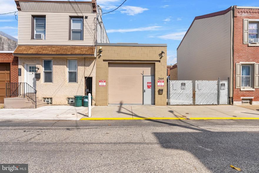 Newer construction garage in Fishtown. 4+ car parking with security system and electric. Currently used as garage for oversized vehicles and can accommodate a car lift. Removable sidewalk poles for added convenience. Purchase with the adjacent lot next door - please reach out to the Listing Agent for more details.