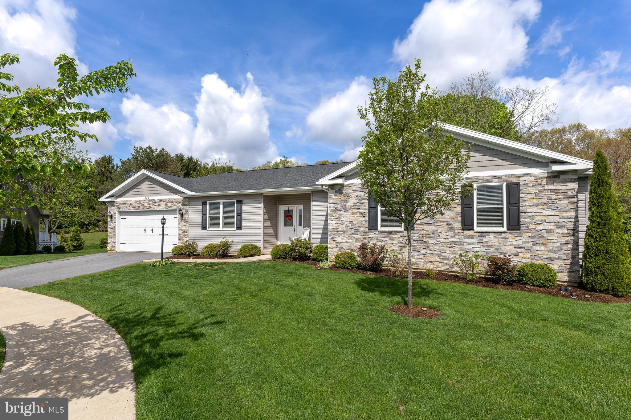 Welcome to this stunning ranch-style home in the desirable Coventry Place community! With an open floor plan and soaring 9-foot ceilings, this home offers the perfect blend of spacious comfort and stylish living—ideal for both relaxing with family and entertaining friends. The oversized custom kitchen is a true centerpiece, featuring granite countertops, stainless steel appliances, a gas cooktop, and both a peninsula and island for maximum functionality. Just off the kitchen, a light-filled formal dining room adds elegance to every meal.
Adjacent to the kitchen, the cozy family room invites you in with a warm gas fireplace and sliding doors leading to the private back patio—an ideal space for outdoor enjoyment and relaxation. One side of the home includes a versatile office/playroom/den, a convenient laundry room, and a half bath. On the opposite side, two spacious bedrooms with ceiling fans and carpet share a full hall bath. The generous primary suite is a retreat of its own, complete with a walk-in closet, a luxurious jetted soaking tub, a walk-in tile shower, and a double granite vanity.
The finished staircase leads to an expansive unfinished lower level with great potential—it already includes an egress window, radon mitigation system, and is pre-plumbed for a future bathroom. Tucked away at the end of a peaceful cul-de-sac, this home offers privacy while remaining just minutes from shopping, dining, and campus. Don’t miss this incredible opportunity to own a beautifully designed home in a prime location! The HOA takes care of all your lawn maintenance and snow removal needs, ensuring that your property always looks its best. You can rest easy knowing that everything from grass cutting to snow clearing is handled professionally, allowing you to enjoy a worry-free lifestyle!