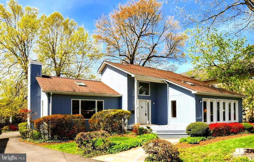 A hundred a ONE HUNDRED AND FIFTY THOUSAND DOLLAR DECREASE IN PRICE....makes this the best opportunity in downtown McLean!!! An incredible home at this price in downtown McLean offering MULTI-GENERATIONAL LIVING! This is the most amazing offering on the market!!! The main level offers the potential for two primary suites each with a full bath!!! One of the primary bedrooms is complete with a walk-in closet, dressing area, soaking tub, double vanity and HUGE walk-in shower. It even accesses it's own private deck with French doors!  The other potential primary serves currently as a a HUGE library/in-home office with a wall of floor to ceiling Andersen windows. Two-story ceilings greet you with a wood-burning fireplace as the focal point. Hardwood flooring, open floor plan with center peninsulas in the kitchen with granite is open to the dining and living rooms!!! The wood-burning fireplace is a stunning focal point! Dine al fresco on the covered, screened-in porch. The upper level offers 2 more bedrooms, a full bath, and incredible storage. The lower level family room boasts 12-foot ceilings.... THEN.... enter the foyer with a separate, exterior entrance to a complete 2 bedroom, 1 bath apartment with a full kitchen and its own washer and dryer. The private entrance walks out to a covered space on the back of the house for maximum privacy. The oversized, detached, two-car garage has a separate entrance to ANOTHER separate apartment with full kitchen, sun-drenched skylight, full bath with another washer and dryer connectiong to a bedroom with extra storage!!!! This home is such a stunning find on a very quiet, secluded street but 1.5 blocks to shopping, fantastic restaurants, and novelty shops!!! This home offers spectacular one-level living, with three finished levels. PLUS TWO separate apartments for parents, an au-pair or teen suite, separate in-home office, extra income as rentals or air BNB!!! The charm on the front of this house will make you feel like you are coming home to vacation every day!! But step inside to SO many possibilities with SIX zoned heating, a brand new roof and a gorgeous fenced and private yard!!! This is a once in a life time opportunity. All of the most well-read publications are talking about multi-generational living being the best new housing!!! Hurry before it is gone at this price!!!!