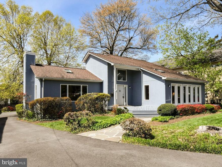 An incredible home at this price in downtown McLean offering MULTI-GENERATIONAL LIVING! This is the most amazing offering on the market!!! The main level offers TWO primary suites each with a full bath!!! One of the primary bedrooms is complete with a walk-in closet, dressing area, soaking tub, double vanity and HUGE walk-in shower. It even accesses it's own private deck with French doors!  Walls of Andersen windows, two-story ceilings, hardwood flooring, open floor plan with center island in the kitchen with granite is open to the dining and living rooms!!! The wood-burning fireplace is a stunning focal point! Dine al fresco on the covered, screened-in porch. The upper level offers 2 more bedrooms, a full bath, and incredible storage. The lower level family room boasts 12-foot ceilings.... THEN.... enter the foyer with a separate, exterior entrance to a complete 2 bedroom, 1 bath apartment with a full kitchen and its own washer and dryer. The private entrance walks out to a covered space on the back of the house for maximum privacy. The oversized, detached, two-car garage has a separate entrance to ANOTHER separate apartment with full kitchen, sun-drenched skylight, full bath with another washer and dryer connectiong to a bedroom with extra storage!!!! This home is such a stunning find on a very quiet, secluded street but 1.5 blocks to shopping, fantastic restaurants, and novelty shops!!! This home offers spectacular one-level living, with three finished levels. PLUS TWO separate apartments for parents, an au-pair or teen suite, separate in-home office, extra income as rentals or air BNB!!! The charm on the front of this house will make you feel like you are coming home to vacation every day!! But step inside to SO many possibilities with SIX zoned heating, a brand new roof and a gorgeous fenced and private yard!!! This is a once in a life time opportunity. All of the most well-read publications are talking about multi-generational living being the best new housing!!! Hurry before it is gone at this price!!!!