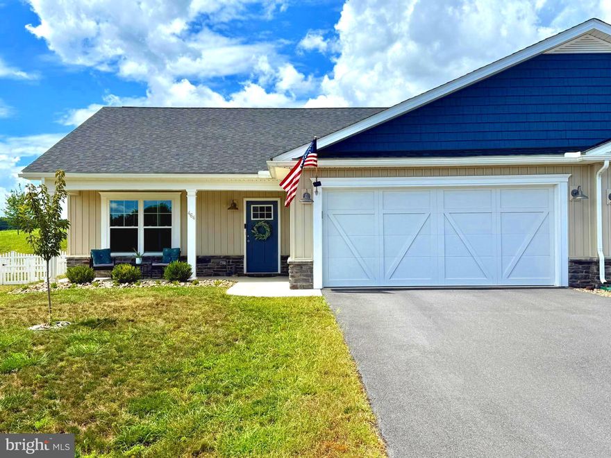 FULL OF UPGRADES! Wow! This 2022 rancher style villa has been impeccably maintained by its sole owner AND it’s already full of premium amenities for you! Enjoy one level living in comfort and style! This  home has a modern open floor plan and has been very thoughtfully designed with flow and storage space. You'll love your upgraded kitchen! There is an oversized island, quartz countertops, stainless GE appliance package, 41" tall cabinets, and all of the cabinet doors and drawers are outfitted with the "soft-close" feature.  The range is also a convection oven with a built-in air fryer. In addition, there is a built-in reverse osmosis water system for the sink tap and refrigerator dispenser, steadily providing you with purified drinking water.  This villa also boasts extra wide 36" doors throughout. The LVP flooring, wall to wall carpeting, and wall colors are tastefully neutral,  allowing you the ease of moving right in! The primary bedroom features a large ensuite bathroom with a temperature controlled bidet, and large walk-in closet. The two car garage is has a convenient built-in, deep storage closet. Your backyard is fully fenced-in and has a lovely covered patio atmosphere for you to enjoy. The location is unbeatable—within only one square mile you'll find schools, medical facilities, shopping, and quick access to the interstate for an easy commute!