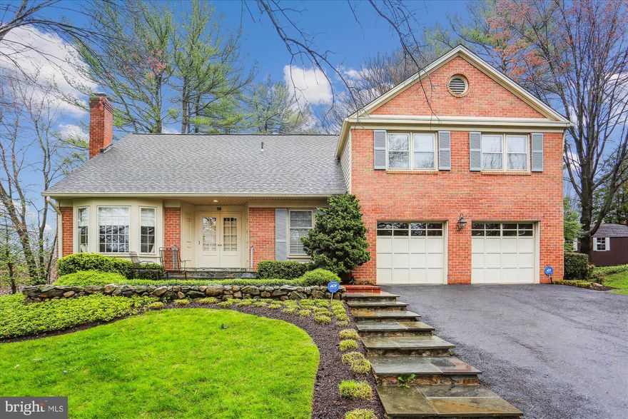 OPEN SUNDAY 1-3pm.  Grand expanded solid brick colonial with RARE five bedrooms and three full baths on the upper level, a front covered flagstone-floored portico entrance with a welcoming brick patio, and a glorious 27 x 15 sunroom addition on a premium private 0.36-acre cul-de-sac lot in the Copenhaver subdivision located in the Wootton school district.  This Kettler Brothers-built Queen Anne model boasts over 5,000 square feet of living area on three levels with a two-car garage and has been meticulously maintained and thoughtfully improved by the original owners to give you a quality-constructed home ready for the second owner to make it their own and transform it into today's design and appeal.  Special features include large formal and entertaining rooms, hardwood flooring on the main and upper levels (currently covered by carpeting upstairs), recessed lighting, two wood-burning brick fireplaces, elaborate moldings, volume ceilings, skylights, and multiple built-ins throughout the entire home.  The remodeled cherry and stainless kitchen opens to a stunning sunroom and adjoining family room with a brick fireplace, built-in bookcases, and bookshelves.  Reconfigured primary bedroom suite with vaulted ceiling and a unique primary bath with walls of closet built-ins. Peaceful and secluded outdoor space featuring an expansive flagstone patio with curved brick privacy knee wall, professionally landscaped fenced-in rear yard, mature specimen trees, and manicured beds of designer shrubbery.  Double-door entry doors to foyer and center hallway with dual wall sconces and walk-in coat closet; formal living room with brick fireplace and bow window with built-in bench seating; formal dining room with detailed molding, recessed lighting, and wall sconces; cherry kitchen with Subzero, Thermador and Bosch stainless appliances, bow window with bench seating, and pass-through to family room; step down to magnificent sunroom with tons of natural light from the vaulted  ceiling, three skylights, recessed lighting, walls of floor-to-ceiling casement windows, and French doors leading to flagstone patio and fenced yard; family room with brick masonry fireplace, bench seating, and a built-in entertainment center flanked by bookcases; secluded study with built-in office desk and bookcases; solid oak staircase to upper level hallway with linen closet; primary bedroom suite with vaulted ceiling, sitting area, and luggage storage closet; redesigned primary bath with dual vanity areas, whirlpool tub on designer tile tub deck,  ceramic tiled walk-in shower, and walls of built-in closet storage; four additional bedrooms and two other ceramic tiled full baths on this upper level; lower-level recreation room with recessed lighting, full bar with sink and beverage fridge, and multiple built-in workstation desk areas and shelving surround the entire room; laundry room with multiple storage closets and separate utility room in this lower level as well.  Copenhaver is one of Potomac’s most desired neighborhoods with its own 10-acre private park featuring a pond, gazebo, two tennis courts, basketball courts, a tot lot, a baseball field, walking paths, picnic tables, and benches. A few blocks away sits the Montgomery Square Copenhaver Swim Club which is community-owned and operated with a recently renovated heated 25-meter pool, a baby pool with interactive water features, a swim team, a sports court, and a playground. Shop and dine at nearby Cabin John Shopping Center, Park Potomac, and Potomac Woods Plaza.