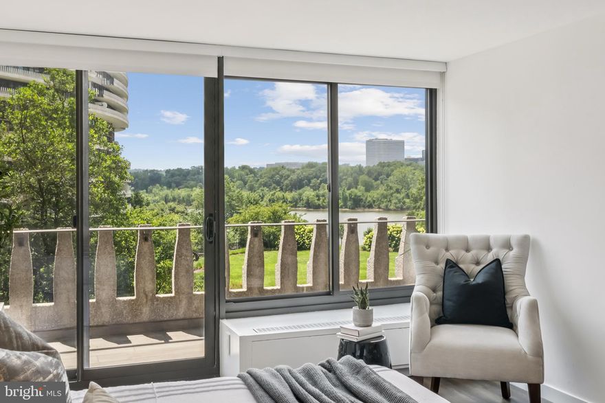 Set within the legendary Watergate complex—one of Washington’s most storied and architecturally significant addresses—this rare, fully renovated four-bedroom residence is a masterstroke of modern luxury and timeless appeal. A sweeping terrace runs the full length of the apartment, seamlessly connecting all the principal rooms and offering a truly effortless indoor-outdoor flow. Even more exceptional is the second, larger terrace—a covered outdoor living and dining room that allows for al fresco enjoyment rain or shine. One of only four such terraces in the entire building, this expansive, sheltered space is an extraordinary rarity. Together, the two terraces offer panoramic views of the Potomac River, the lush Kennedy Center lawns, and a tranquil canopy of trees—bringing nature into every moment, all year long.

Inside, the 2017 renovation brought a crisp, clean aesthetic with a focus on openness, light, and functionality. At the heart of the home, the custom Siematic kitchen is equal parts form and function, with warm wood and crisp white cabinetry, a Miele appliance suite, and exceptional organizational features that make daily living effortless. The kitchen anchors a flowing great room concept that is ideal for both intimate gatherings and grand entertaining.

The serene owner’s suite offers a spa-inspired bath with a glass-walled shower and sleek Grohe fixtures, and a generous walk-in closet. Secondary baths echo this elevated style and there’s even a powder room for guests. Four spacious bedrooms provide incredible flexibility—perfect for hosting guests, working from home, or carving out private retreats. Throughout the residence, abundant storage has been thoughtfully integrated to maintain the clean lines and uncluttered feel of the space. An in-unit washer and dryer add daily convenience. 

Beyond the residence, a private garage parking space, 24-hour concierge, and round-the-clock security enhance everyday ease. Live effortlessly in this full-service building, where your every need is attended to with grace and discretion.

Rich in history and home to diplomats, dignitaries, and visionaries, the Watergate remains one of Washington’s most iconic addresses. This extraordinary home honors that legacy—offering the rare combination of expansive outdoor living, flawless renovation, and legendary service.