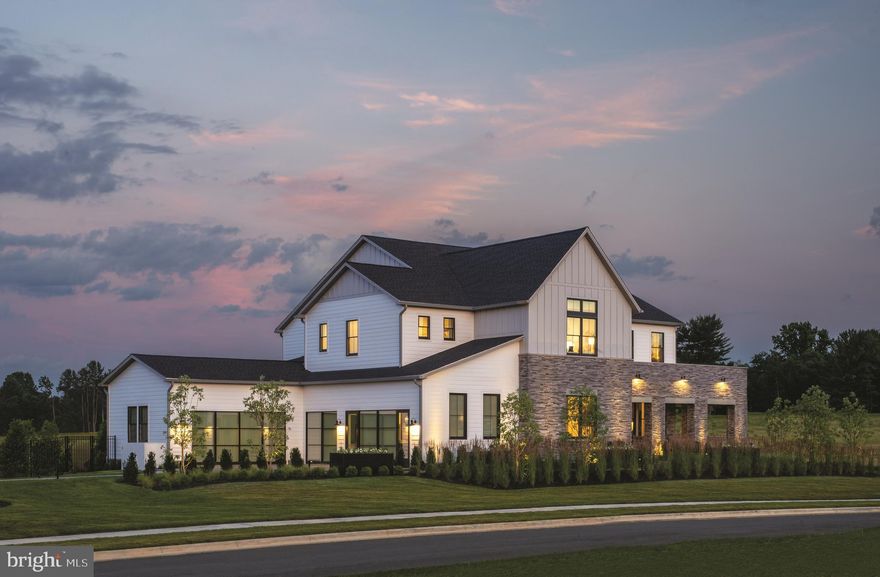 Step into a world of unparalleled sophistication with our distinguished award winning Warhol Modern Farmhouse model home, where every detail has been meticulously curated to offer an exceptional living experience. From the serene modern pool and recreation area to the grand wraparound porch, this residence is designed for ultimate luxury. Enter the breathtaking two-story foyer, featuring an elegant oak staircase and sleek glass railings. The formal dining room showcases a meticulously crafted coffered ceiling, while the inviting study is enhanced with custom-built shelving. The open-concept kitchen is a culinary masterpiece, boasting top-tier Sub-zero, Wolf and Cove appliances, complemented by luxurious quartz countertops. Adjacent, the prep kitchen features high-end KitchenAid appliances, ideal for both everyday cooking and entertaining. Seamlessly blend indoor and outdoor living with the luxury outdoor space, which includes a cozy fireplace and two 15' multi-panel stacking doors by western, that open up to an expansive deck. The main level bedroom suite is thoughtfully designed for multigenerational living, offering both comfort and convenience. Upstairs, discover four elegant bedroom suites, an expansive loft with custom ceiling beams, and a 12-foot stacking door leading to a private terrace. The primary suite is a true sanctuary, complete with a private terrace, a walk-in dressing room, and a lavish bath featuring an oversized shower and soaking tub. The finished basement is a haven for relaxation and entertainment, featuring high ceilings, a spacious recreation room with unique wall coverings, a custom wet bar, a gym area, and a versatile studio/bedroom suite. The fully fenced backyard is an entertainer's paradise, with a spectacular pool, patio, BBQ area, and expansive lawn—perfect for gatherings and leisure. Equipped with cutting-edge Control4 home automation, a full-service elevator, and a 5-car garage, this home combines luxury and convenience. Anderson windows enhance the elegance of every room, while the vibrant neighborhood with tree-lined streets and extensive nature trails offers easy access to top attractions and shopping destinations, including Wolf Trap National Park, Great Falls National Park, and Tysons Corner Center. Come and experience the epitome of modern luxury living. Schedule your visit today and let this exquisite residence become your dream home!