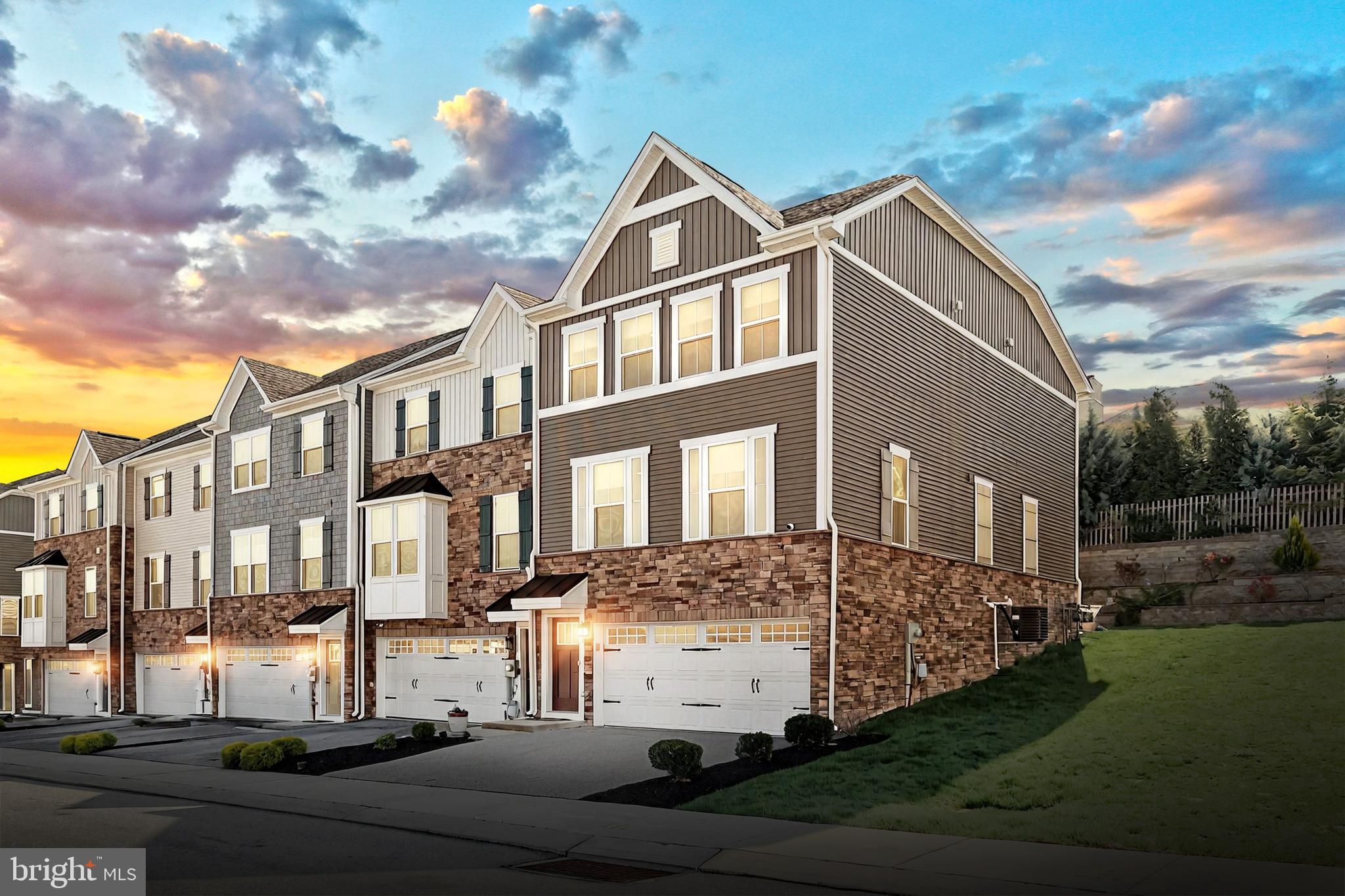 OFFER DEADLINE Thursday May 1 at 4:00 PM.
Welcome to easy living in the beautiful Regents Glen - Rosecroft Community!
This stunning end-of-row townhome offers a bright, open floor plan with thoughtful upgrades throughout. At the heart of the home is the centrally located gourmet kitchen, featuring granite countertops, 42” wall cabinets, an expansive island perfect for casual meals and conversation, stainless steel appliances, an elegant tile backsplash, and recessed lighting.
This main level boasts a smart and flexible layout with two distinct seating areas—one at the front of the home and one at the rear—creating a natural flow around the open-concept kitchen. Whether you envision a dining area in the front or prefer the current setup with a second sitting area and a cozy family room in the back, each space adapts easily to your lifestyle. The rear living area opens to a stamped concrete patio through sliding glass doors, seamlessly blending indoor and outdoor living. With large windows on both sides and high ceilings, the entire floor feels airy, bright, and welcoming.
Step outside onto the patio to fire up the grill and enjoy the peaceful view of terraced landscaping and mature trees—no townhomes directly behind you, offering added privacy and tranquility. A bonus perk: overflow parking is conveniently located in front, just across from the home, perfect for visitors and providing a more open, scenic view from your front windows.
Upstairs, you’ll find three carpeted bedrooms, all with ceiling fans for added comfort. The primary suite is a true retreat, featuring a large walk-in closet with a stylish sliding barn door, and a spa-like en suite bath with a soaking tub, oversized shower, and dual vanities. A tiled laundry room with a deep utility sink adds extra function and convenience on the upper level.
The entry level includes a finished bonus room with a large window—perfect for a home office, gym, or media space. A rough-in for a full bathroom adds future flexibility, and direct access to the two-car garage makes everyday life a breeze.
All of this is nestled within the gated Regents Glen golf course community, where manicured grounds and premium amenities create a resort-like lifestyle. For even more enjoyment, the community’s golf course offers a separate pool membership.
Don’t miss your chance to own this gorgeous, move-in ready home in one of the area’s most sought-after neighborhoods!