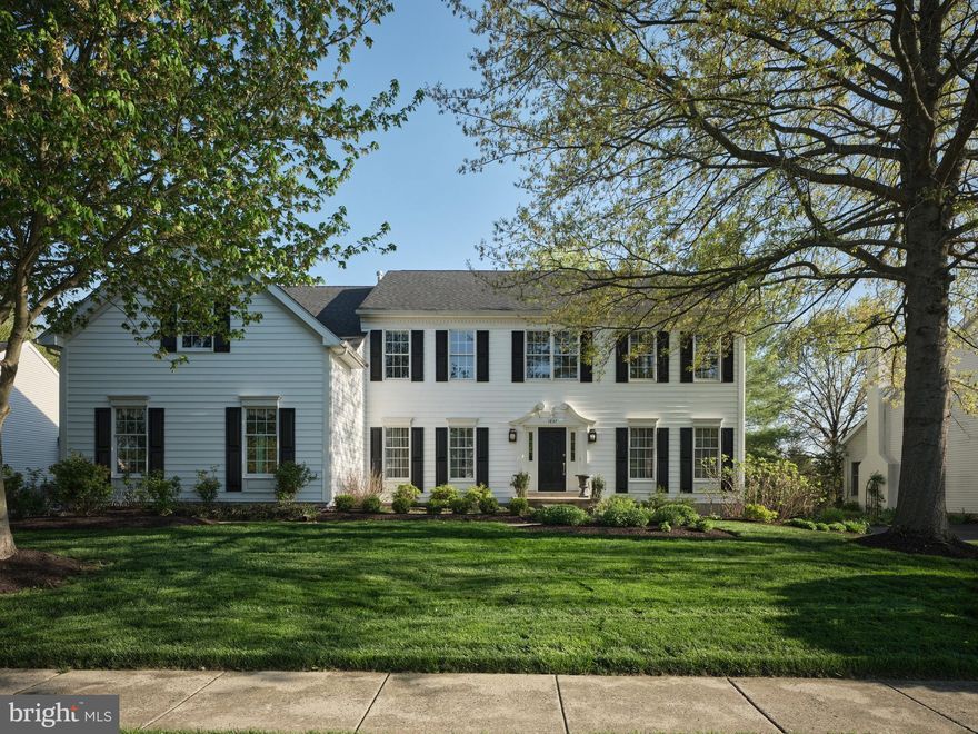 Not your typical Bucks County Country Club Estates home. A distinctive offering within Bucks County Country Club Estates, ideally positioned along the 11th fairway with sweeping golf course vistas and a private, picturesque setting. A charming courtyard-style entrance welcomes you into a dramatic two-story foyer with rich wood flooring featuring a deliberately distressed finish, adding warmth and character throughout. The home offers both front and rear staircases, enhancing flow and everyday functionality. Soaring ceilings, transom windows, skylights, and detailed millwork create a bright, open feel filled with natural light. The formal living and dining rooms are well-proportioned and inviting. The light-filled kitchen is thoughtfully designed with a stainless-steel island, Wolf range with custom hood, built-in refrigerator, and an extended breakfast area with skylight and Palladian doors overlooking the fairway. The adjacent family room is a standout space, highlighted by a floor-to-ceiling stone gas fireplace, a vaulted ceiling with skylights, and expansive windows that frame the views. A private office with a built-in window desk provides a comfortable work-from-home option. A laundry room with exterior access adds convenience. Upstairs, the primary bedroom suite offers a spacious layout with tray ceiling, sitting area, walk-in closet, and a bath with vaulted ceiling. Additional bedrooms are generously sized and share a Jack-and-Jill bath. This home stands apart within the community with custom selections chosen beyond standard builder offerings, creating a more individual and character-rich interior. Outdoor living includes a paver patio, firepit, and stone structure for outdoor kitchen elements overlooking the golf course, all enclosed by a classic white picket fence. Ideally located within walking distance to The Bucks Club, where members may enjoy premier golf and pool amenities. Nearby shopping, dining, and historic Doylestown, New Hope, and Newtown. Easy access to major commuting routes and within the Central Bucks School District.