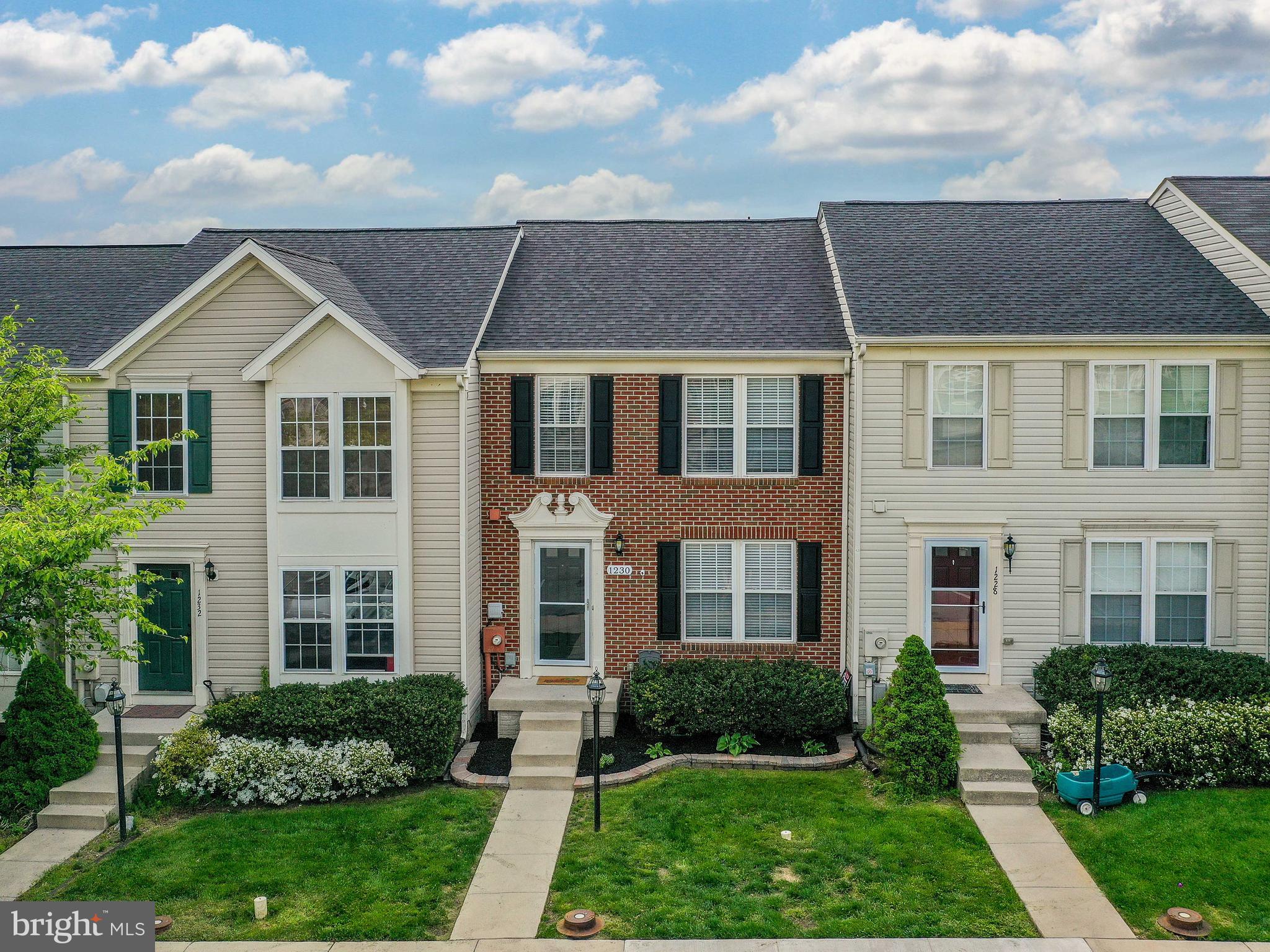 Easy living in this Super Well Cared for 3-level townhome that features a large deck, finished basement, and luxury vinyl plank flooring throughout the main level. The three-level bump out makes the basement, sunroom, and primary bedroom suite significantly larger, creating a spacious home in the popular Fairfax Crossing neighborhood. The spacious main level has a living room, eat-in kitchen, half bath, and sunroom, all in LVP flooring with a lovely open kitchen featuring stainless appliances, Corian counters, and gorgeous light- with a walk-out to the large deck. Upstairs, the primary suite has a vaulted ceiling, 2 walk-in closets, an ensuite bath with soaking tub and dual vanities. 2 additional bedrooms and a full bath round out this level. The finished lower level has a large rec room big storage room or office, and large laundry with lots of room for storage. This lower-level walks out to the cement patio for shade on those hot days. ***New Roof, New HVAC, New Water Heater, and new floors throughout thetop two levels! ***