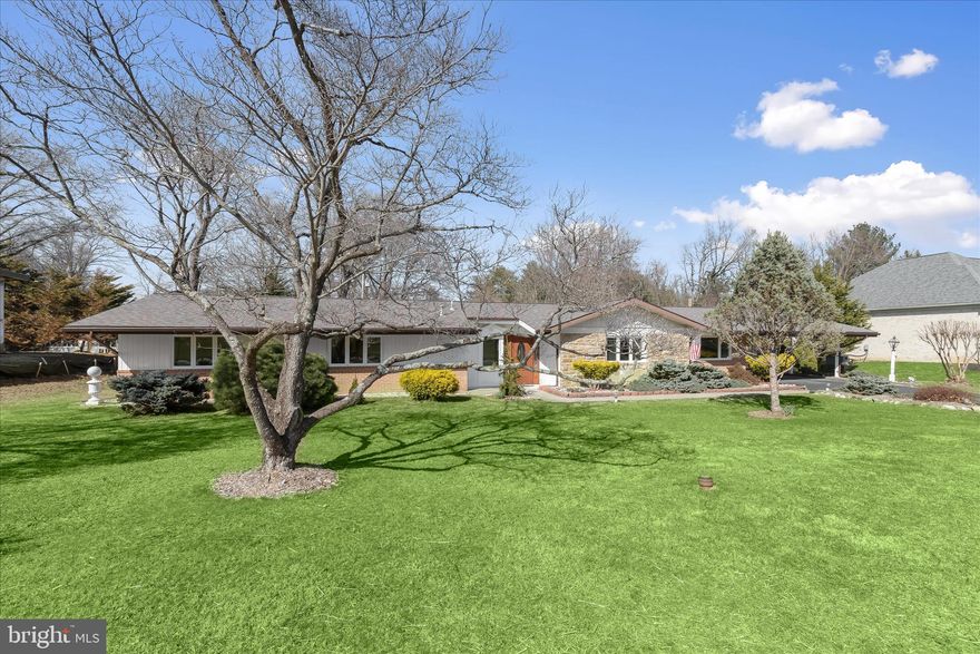 Presenting this exceptional one-level rancher in the sought-after Stevenson neighborhood, offering three bedrooms with two and a half bathrooms. Set on a 0.38 acre lot, meticulously manicured landscaping greets you as you arrive, with fruiting trees and bushes in the backyard including persimmons, sour dark cherries, peach, Asian pears, gooseberries, blackberries, raspberries and more. Step inside the foyer where tall vaulted ceilings, abundant natural light, and a freshly painted neutral color theme create a warm and inviting ambiance that continues throughout this spectacular home. The front living room provides a welcoming spot to relax, while the adjacent breakfast nook is ideal for casual dining. The eat-in kitchen is equipped with stainless steel appliances, granite countertops, a center island, and sliding glass doors outside. Just beyond the kitchen is a half bathroom and a laundry room with a walk-in pantry closet and access to the carport. The open concept living and family rooms offer generous space for hosting gatherings, with sliding glass doors outside to the covered patio overlooking the backyard. Down the hall is the bedroom wing of the house, including the primary bedroom suite that has its own private bathroom with a walk-in shower, along with generous closet space. Two additional bedrooms share a hall full bathroom with a tub shower. Outside, there are two storage closets on the exterior of the home, with an additional shed for storing outdoor essentials. The fenced backyard offers a peaceful retreat with a full garden and space for everyone’s outdoor activities. Recent updates include a new heat pump (2024), 55 gallon water heater (2024), roof (2021), along with new energy-efficient insulated windows and exterior doors approximately ten years ago. Enjoy the convenience of one-level living and this phenomenal location in the desirable Stevenson, close to everything you need.